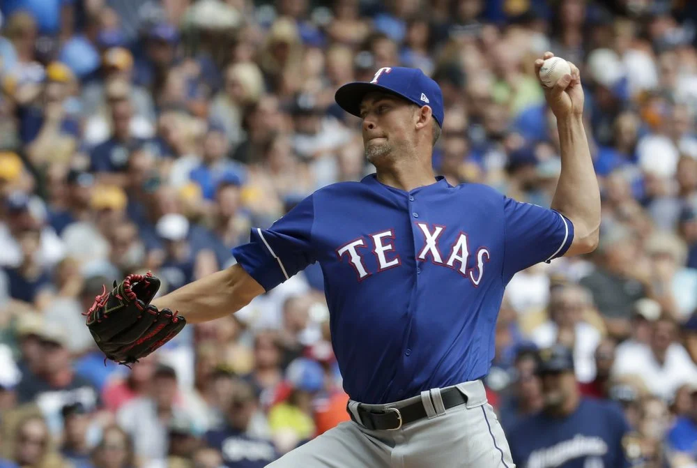 Minor, Rangers edge Brewers 1-0