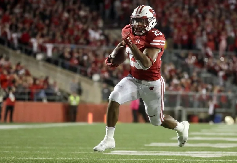 Running track sped up success for Badgers RB Jonathan Taylor