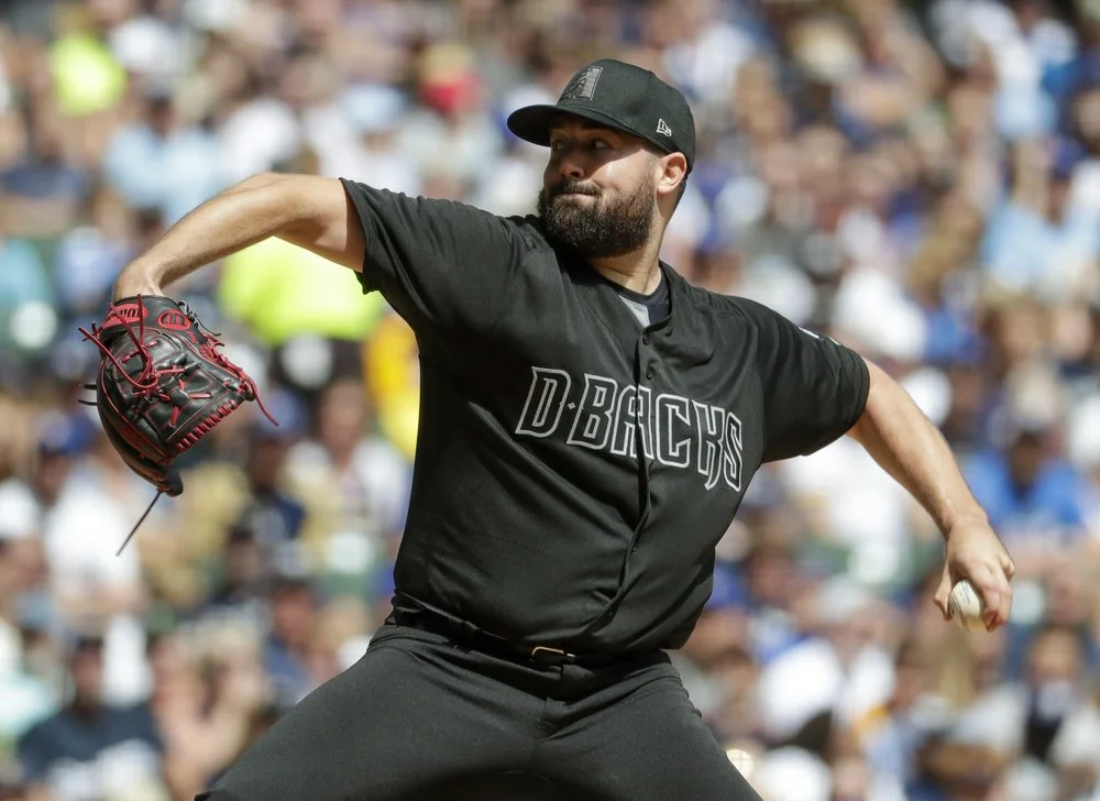 Ray helps D’backs avoid sweep, beat Brewers 5-2
