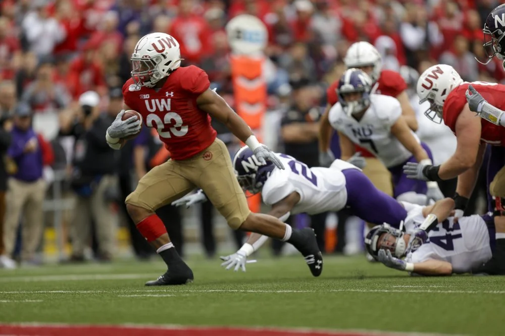 Taylor, defense lead No. 8 Badgers past Northwestern 24-15