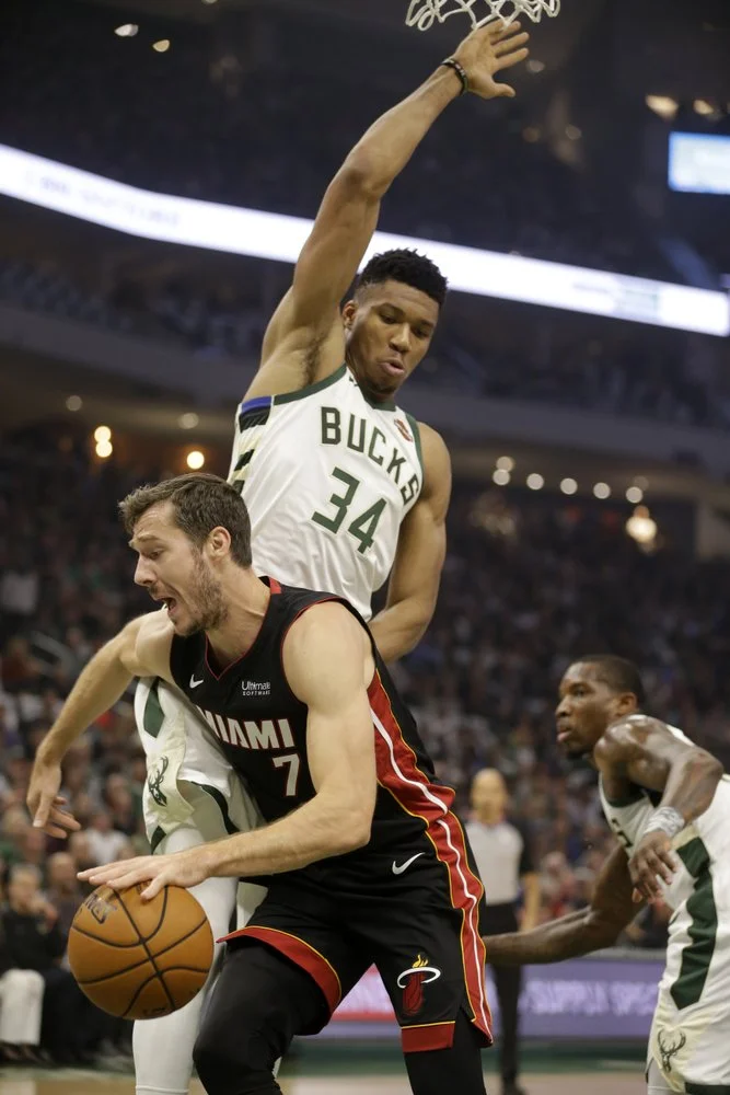 Heat spoil Bucks’ home opener, rally to 131-126 win in OT