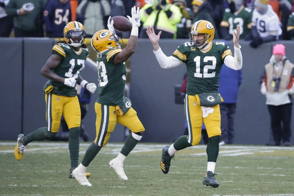 Packers playoff bound, beat Bears in rivals’ 200th game