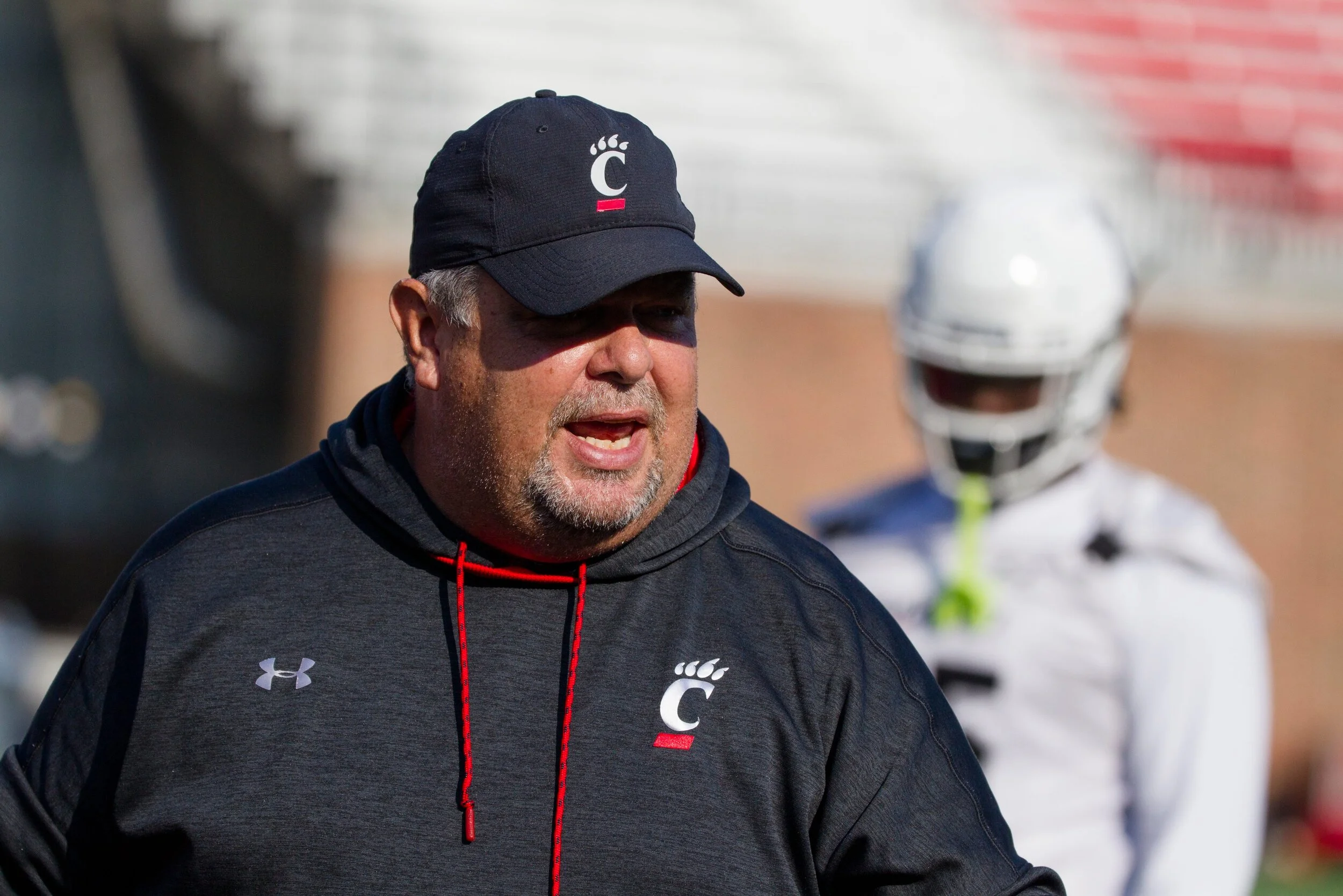 Bearcats O-line coach Ron Crook is shuffling deck to find right combination up front