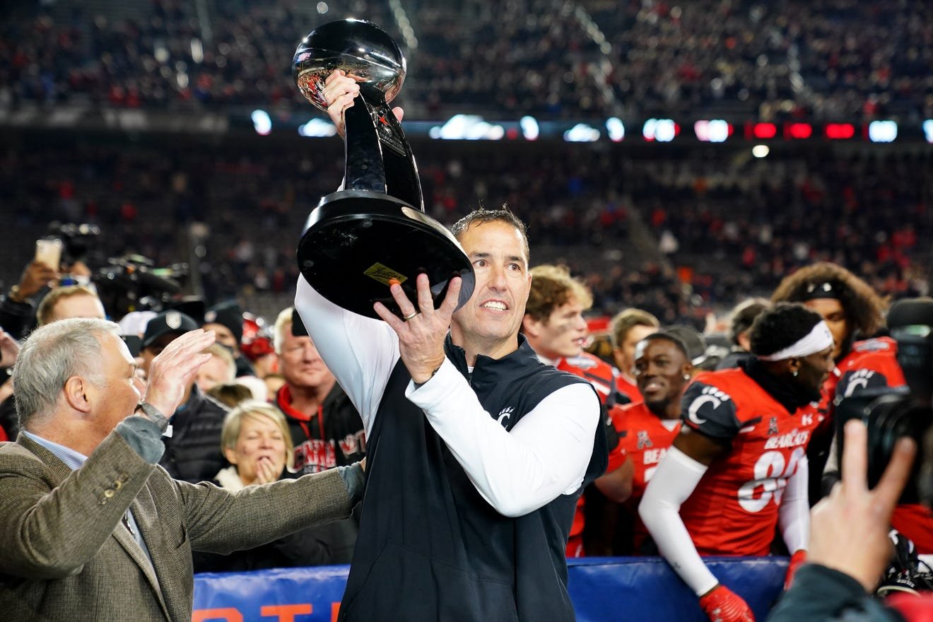 As other coaches left, Luke Fickell stayed at Cincinnati to continue to build