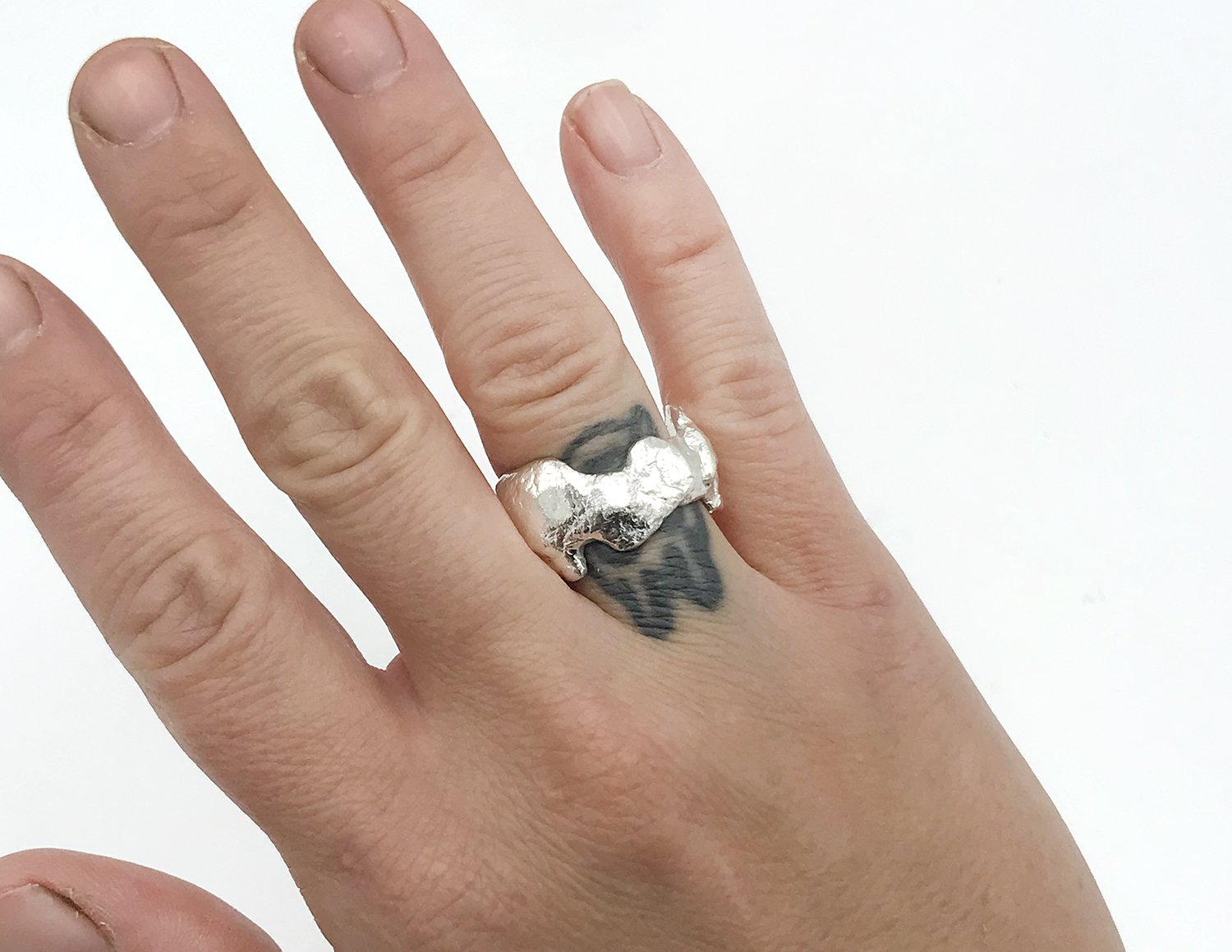 Christine Fail Ring on Hand.jpg