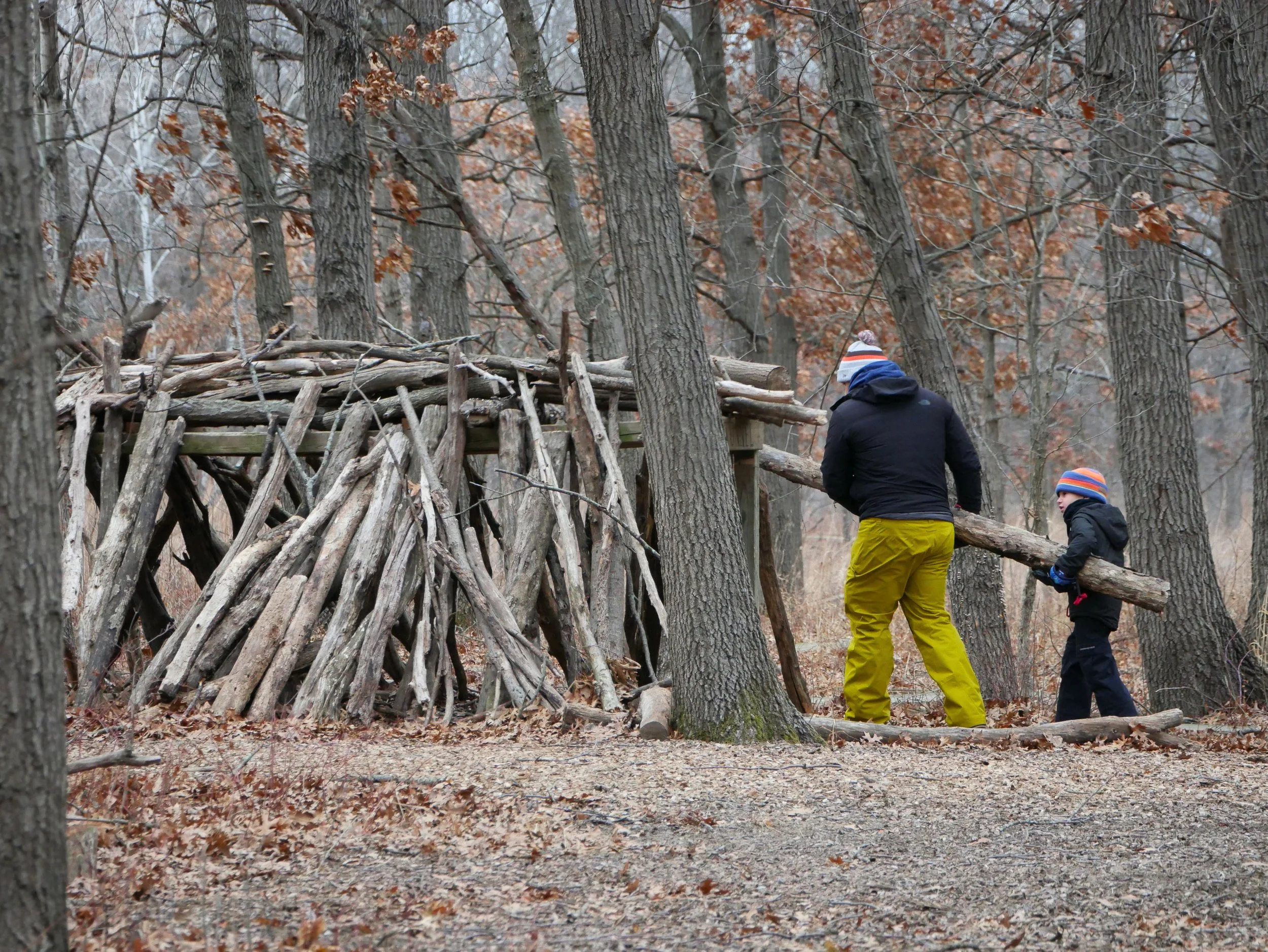 Children and parents building a fort together at Let's Play!