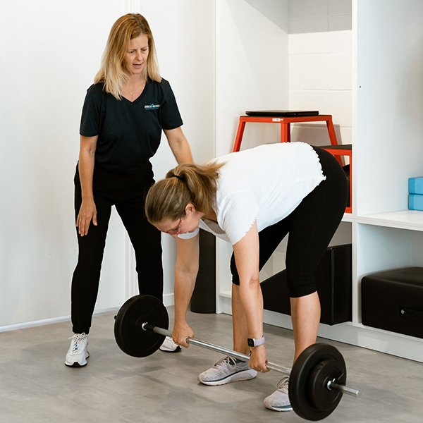 woman-lifting-weights-embody-movement.jpg