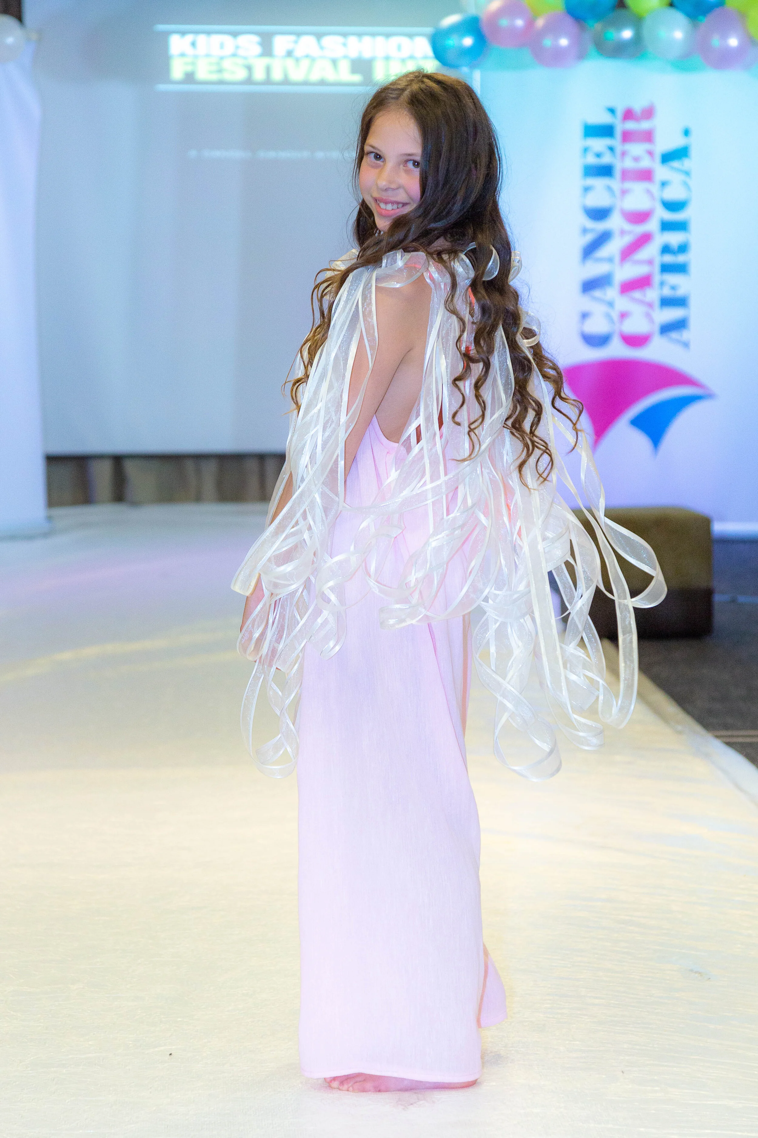 Modelling for “Be Unique Be You” at The Cancel Cancer Africa Fashion Festival