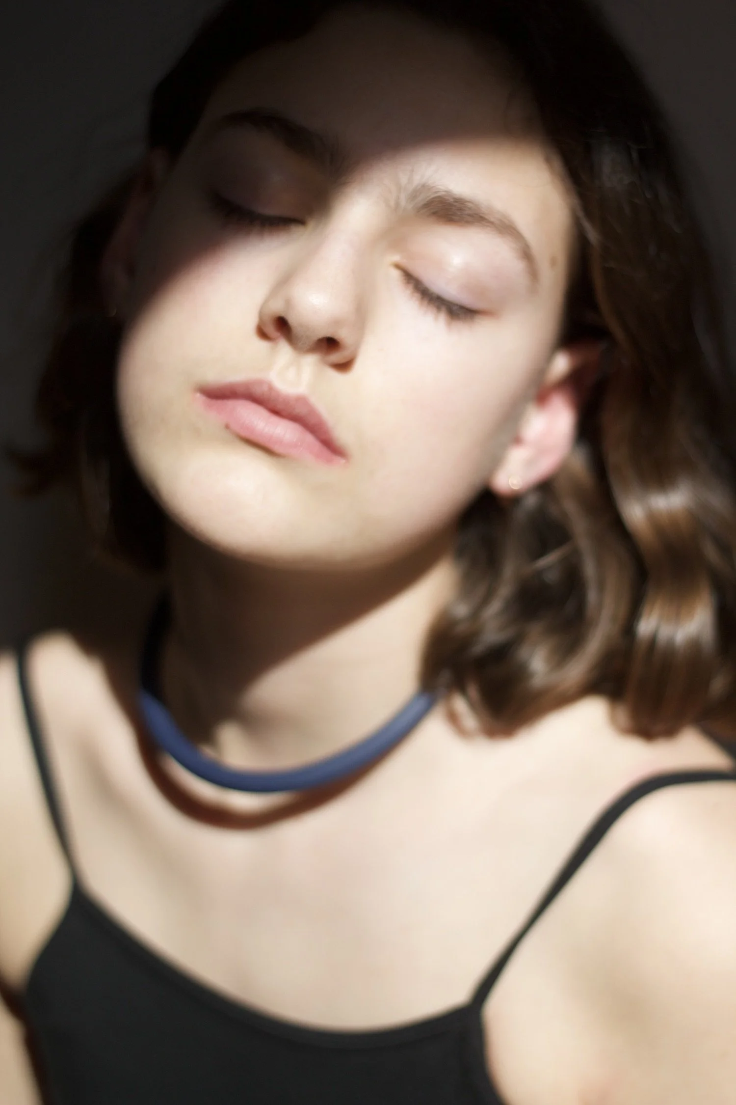girl wearing a choker in the sun