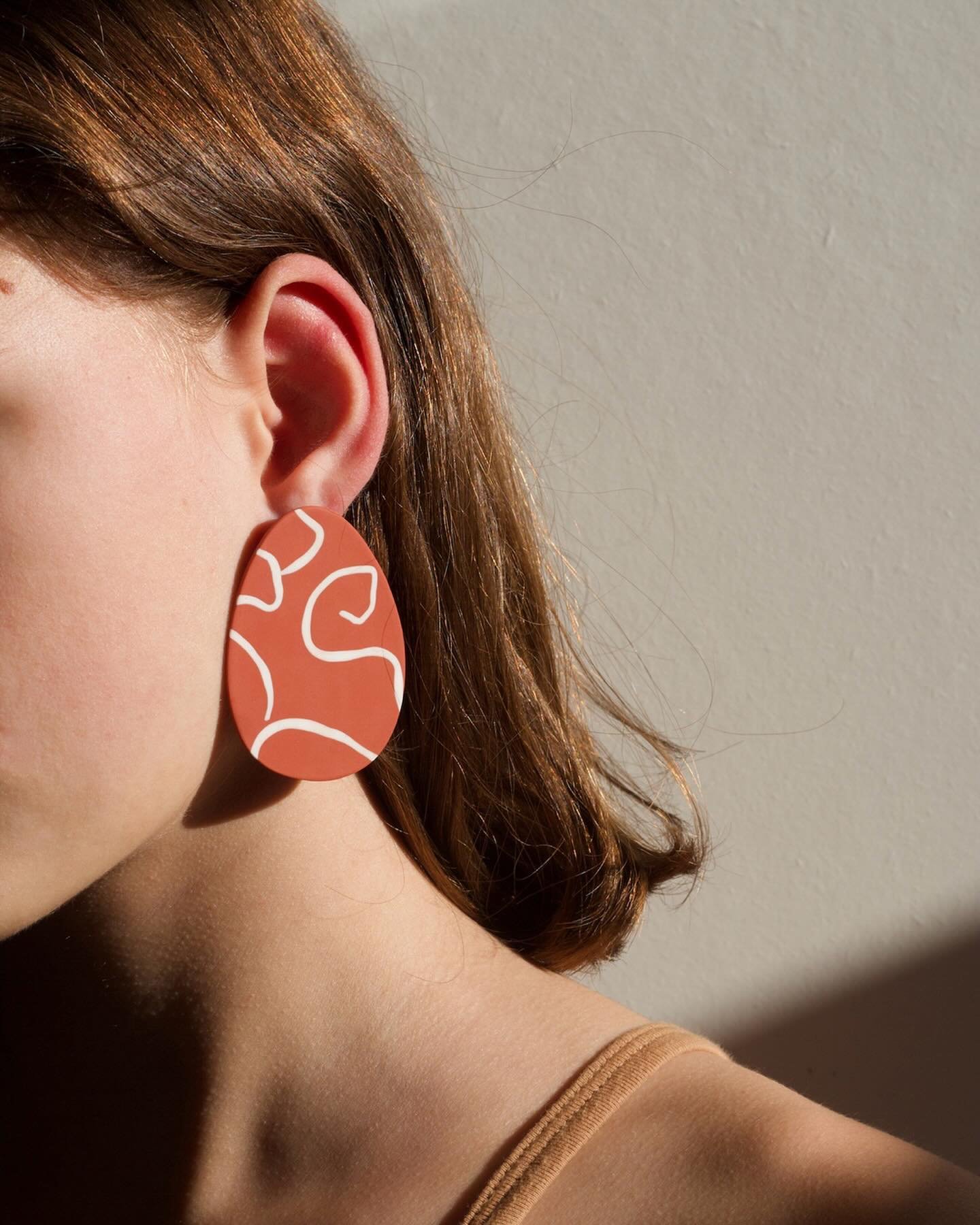 A best-seller from all times, Abstract in Terracota, Black and Translucent. Which one is your favorite? #hellozephyr #handmade #jewelrydesign #moderjewelry #earrings