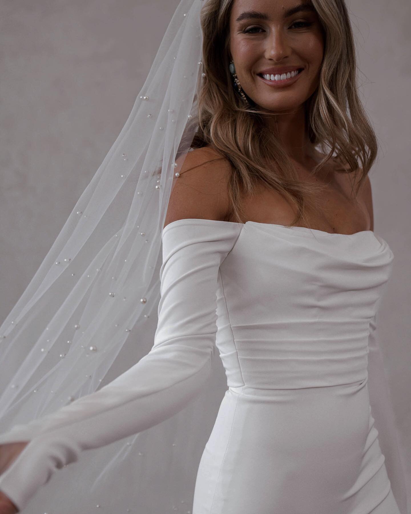 WINTER&bull; Another new arrival- this stunning French Crepe gown with off the shoulder sleeves and fitted shape&hellip;. Buttons the whole length of the train finish the look @madewithlovebridal #whitebridewales #bridalboutiquenarberth #madewithlove