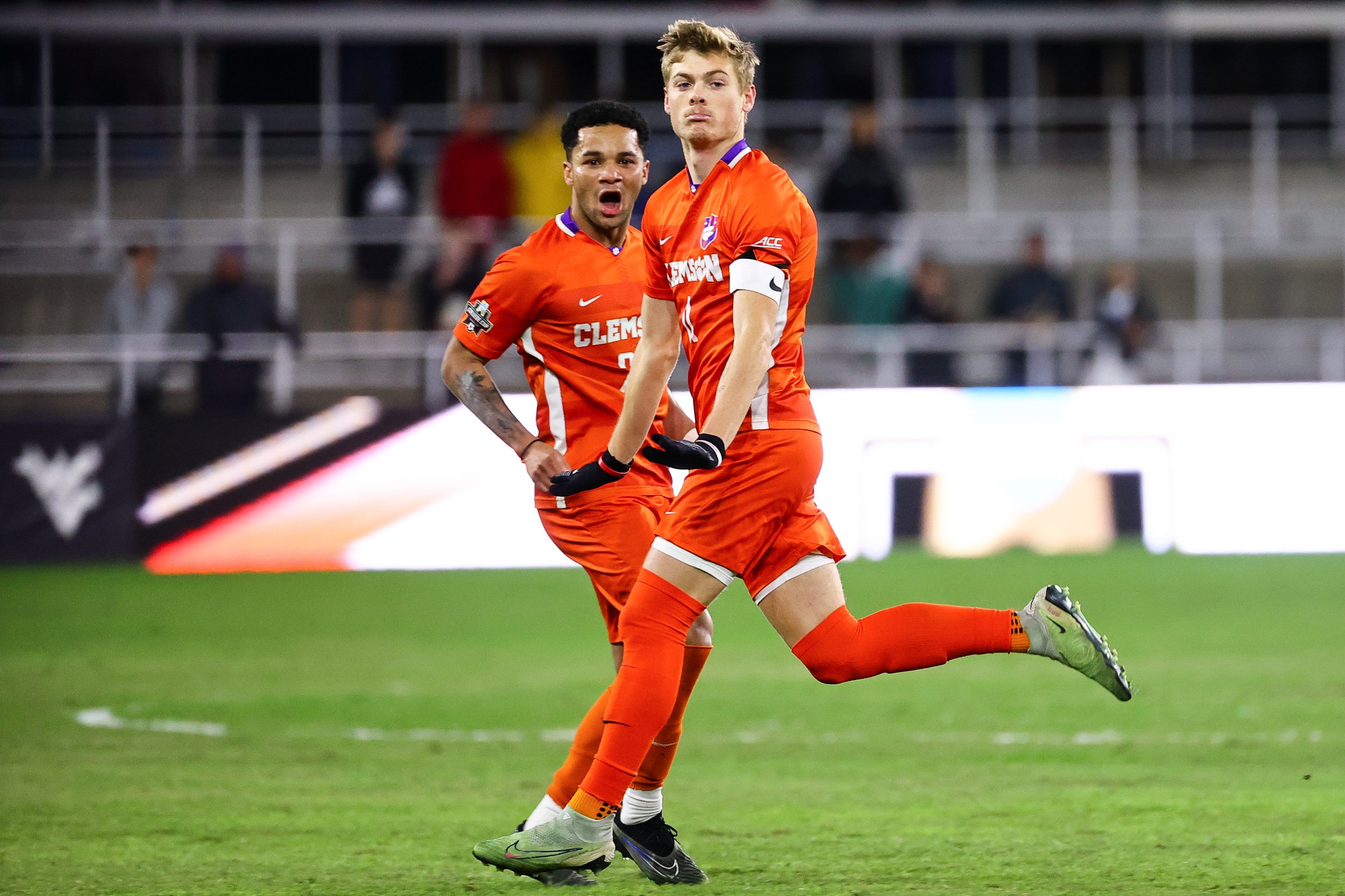  LOUISVILLE, KENTUCKY - DECEMBER 11: Shawn Smart #20 and Brandon Parrish #11 of the Clemson Tigers celebrates a goal against the Notre Dame Fighting Irish during the Division I Men’s Soccer Championship held at the Lynn Family Stadium on December 11,