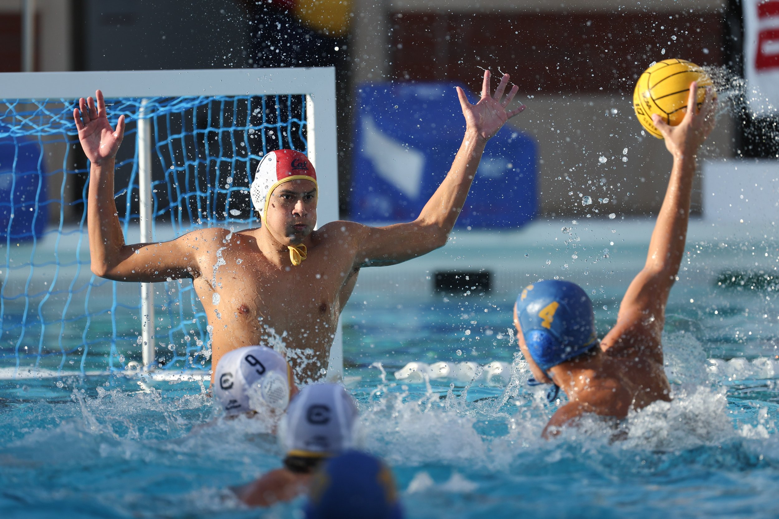  LOS ANGELES, CALIFORNIA - DECEMBER 3: Adrian Weinberg #1 of the California Golden Bears sets to defends a penalty shot from the UCLA Bruins during the National Collegiate Men's Water Polo Championship held at Uytengsu Aquatics Center on December 3, 