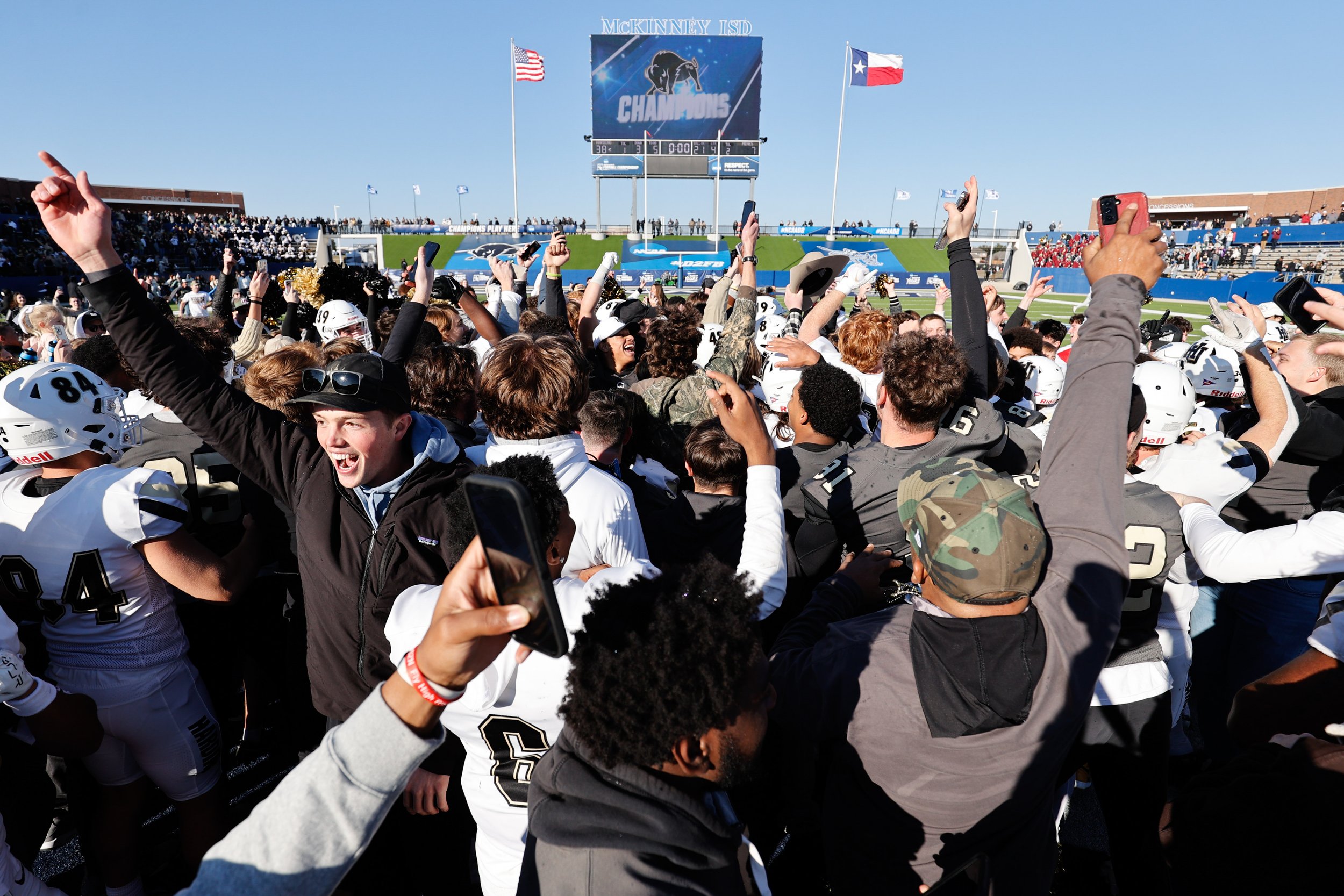  MCKINNEY, TEXAS - DECEMBER 16: Fans rush the field after the Harding Bisons beat the Colorado School of Mines Orediggers to win the Division II Football Championship held at McKinney ISD Stadium on December 16, 2023 in McKinney, Texas. (Photo by C. 