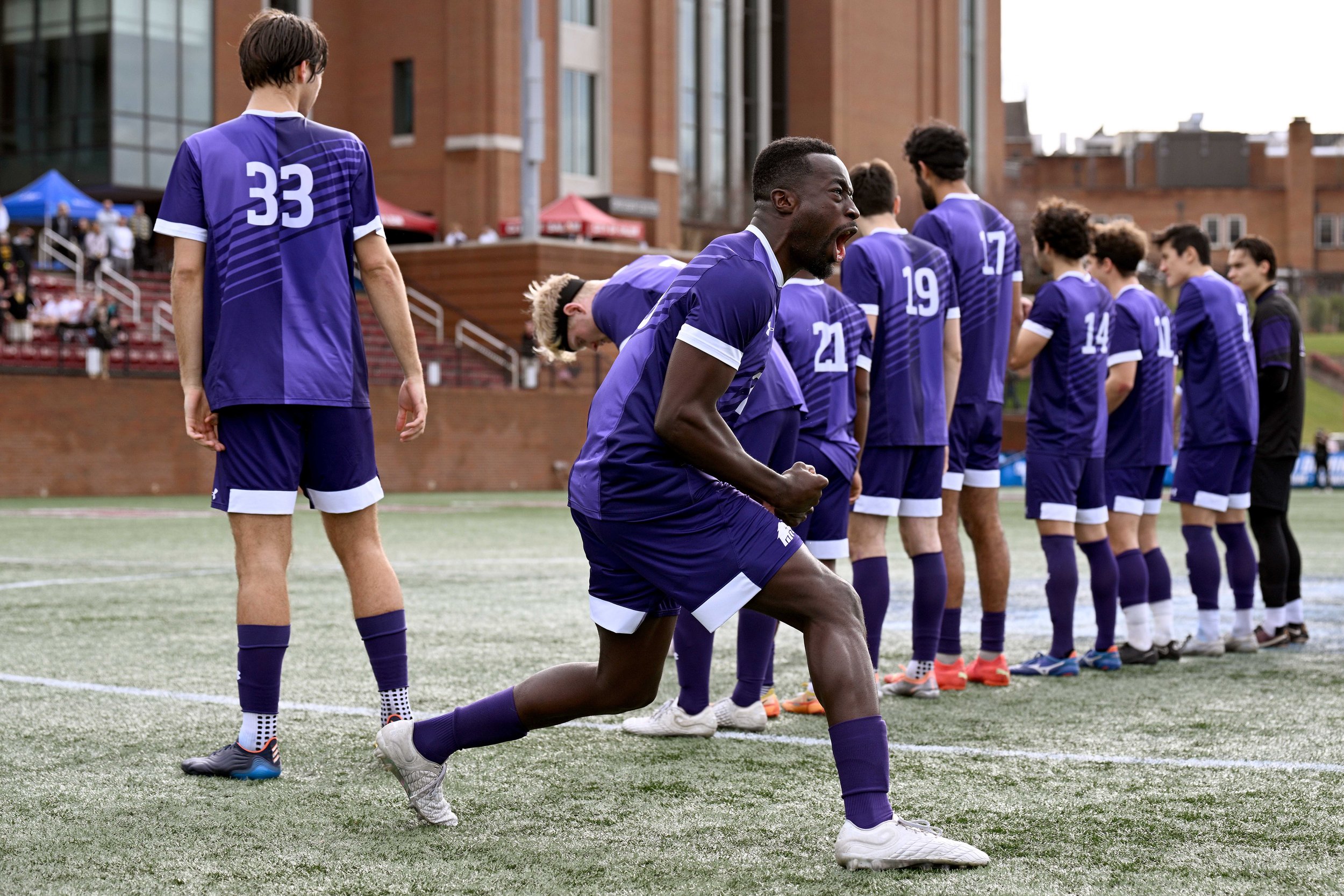  SALEM, VIRGINIA - DECEMBER 03: Ada Okorogheye #23 of the Amherst Mammoths reacts as he is introduced during the 2023 Division III Men's Soccer Championship game against the St. Olaf Oles at Donald J. Kerr Stadium on December 03, 2023 in Salem, Virgi