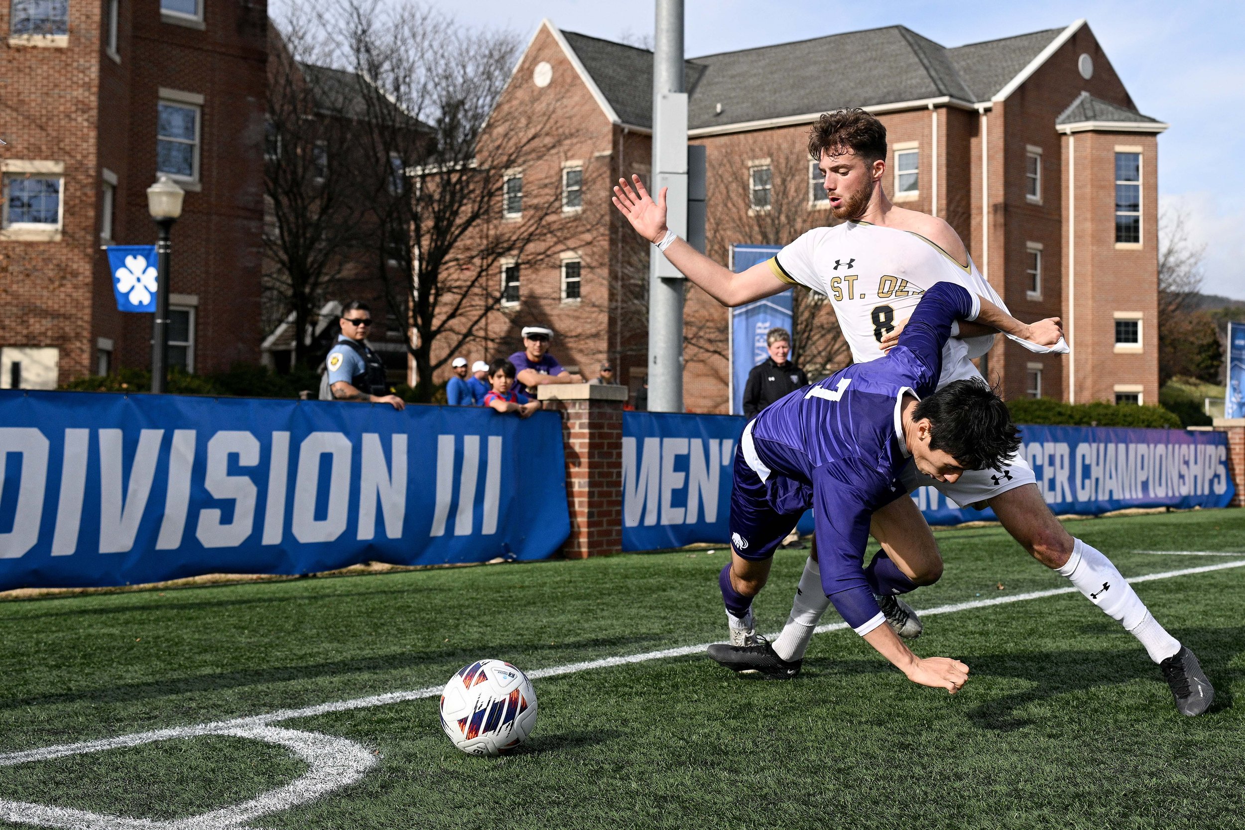  SALEM, VIRGINIA - DECEMBER 03: Niall Murphy #7 of the Amherst Mammoths defends Victor Gaulmin #8 of the St. Olaf Oles in the corner during the 2023 Division III Men's Soccer Championship at Donald J. Kerr Stadium on December 03, 2023 in Salem, Virgi