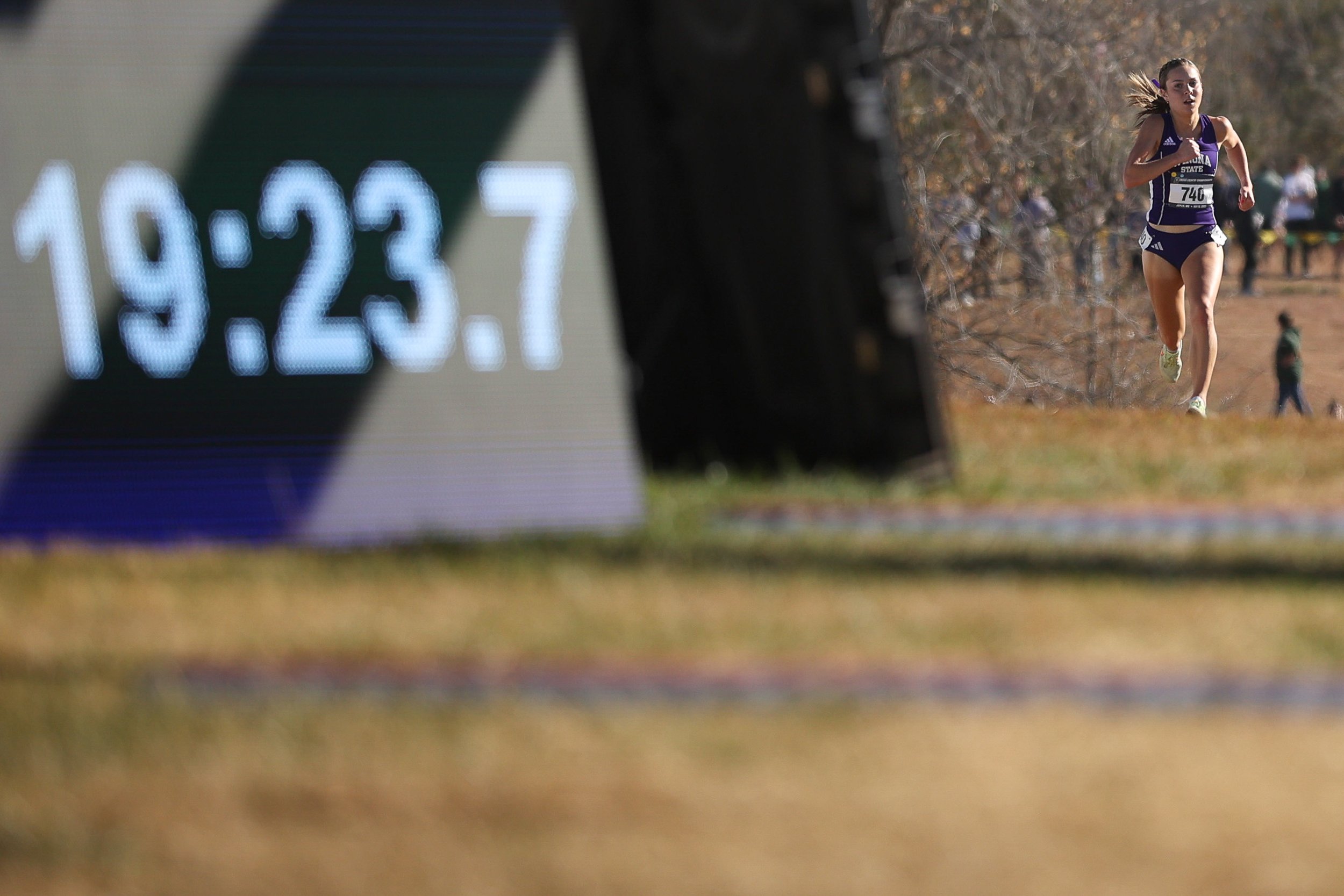  JOPLIN, MISSOURI - NOVEMBER 18: Lindsay Cunningham of the Winona State Warriors approaches the finish line during the Division II Women's Cross Country Championship held at Tom Rutledge Cross Country Course on November 18, 2023 in Joplin, Missouri. 