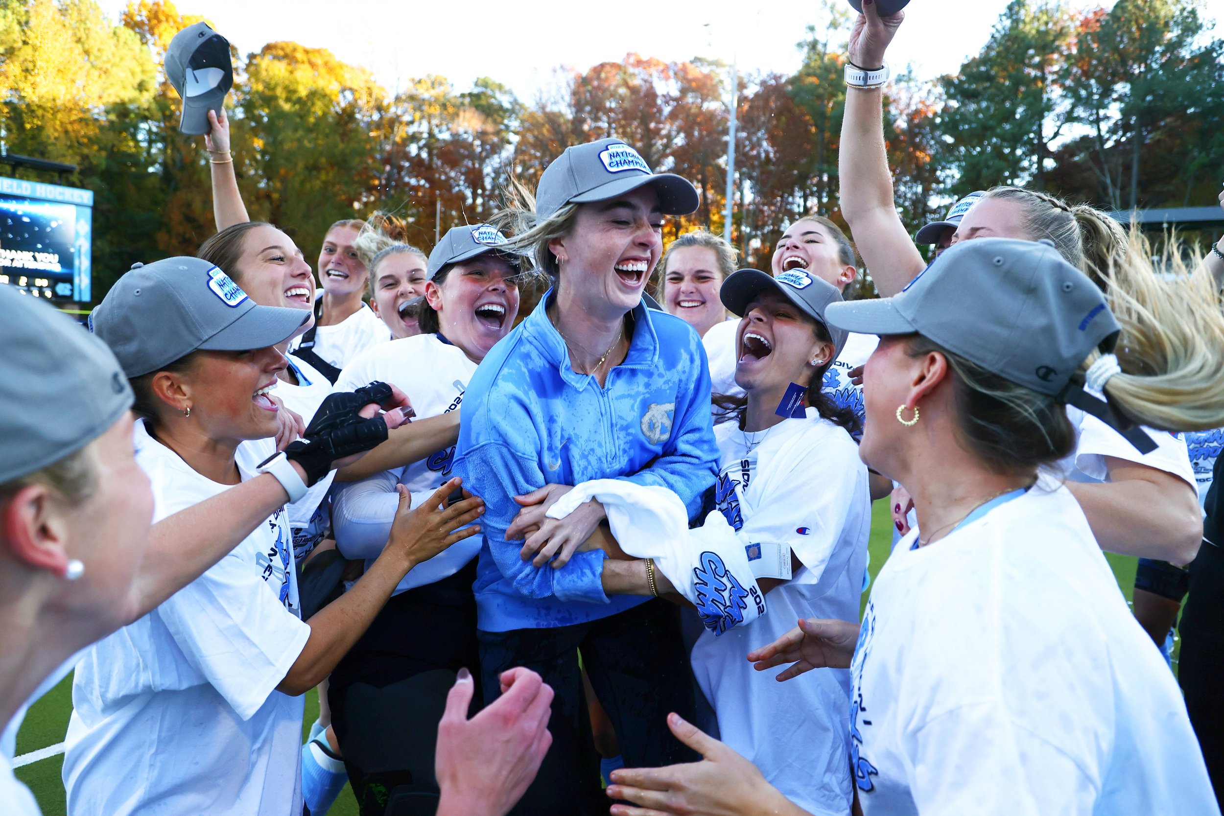  CHAPEL HILL, NORTH CAROLINA - NOVEMBER 19: Head Coach Erin Matson of the North Carolina Tar Heels celebrates with her team after defeating the Northwestern Wildcats for the national title during the Division I Women’s Field Hockey Championship held 