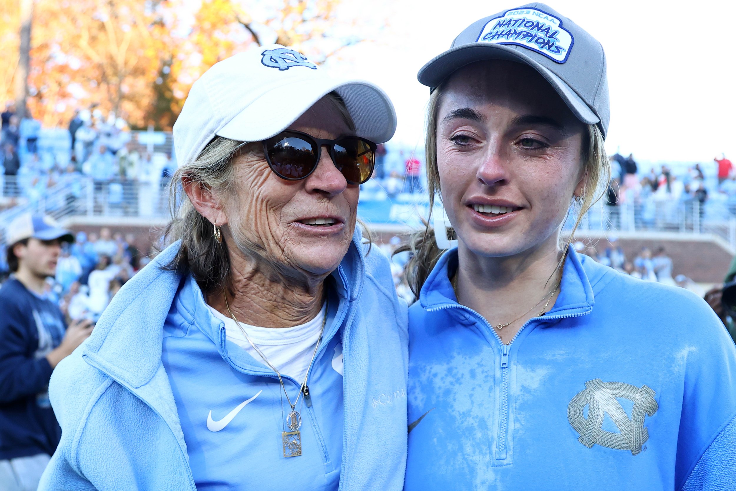  CHAPEL HILL, NORTH CAROLINA - NOVEMBER 19: Head Coach Erin Matson of the North Carolina Tar Heels celebrates with former head coach Karen Shelton after defeating the Northwestern Wildcats for the national title during the Division I Women’s Field Ho