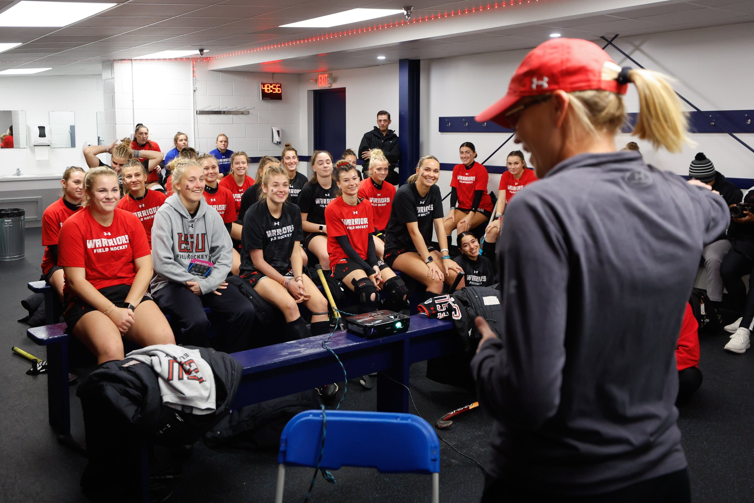  MANCHESTER, NEW HAMPSHIRE - NOVEMBER 19: The East Stroudsburg University Warriors listen to coaches in the locker room before taking on the Kutztown Golden Bears in the 2023 Division II Field Hockey Championship at Grappone Stadium on November 19, 2