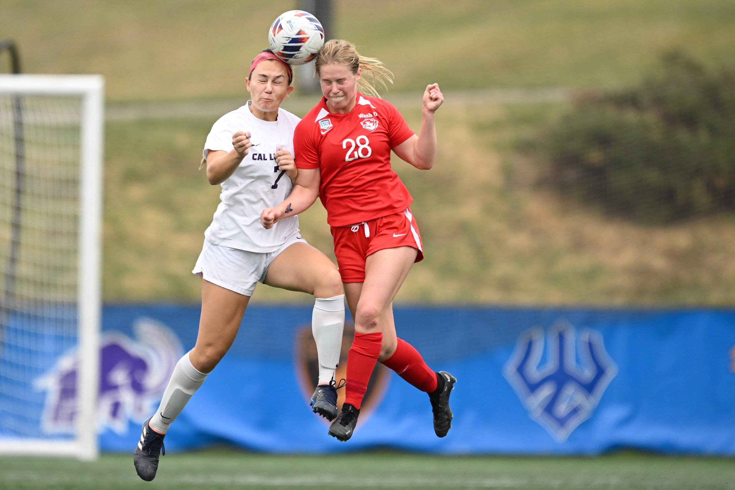 SALEM, VIRGINIA - DECEMBER 02: Ally Fisicaro #7 of Cal Lutheran Regals and Grace Ehlert #28 of Washington Bears compete for the ball during the 2023 Division III Women's Soccer Championship at Donald J. Kerr Stadium on December 02, 2023 in Salem, Vi