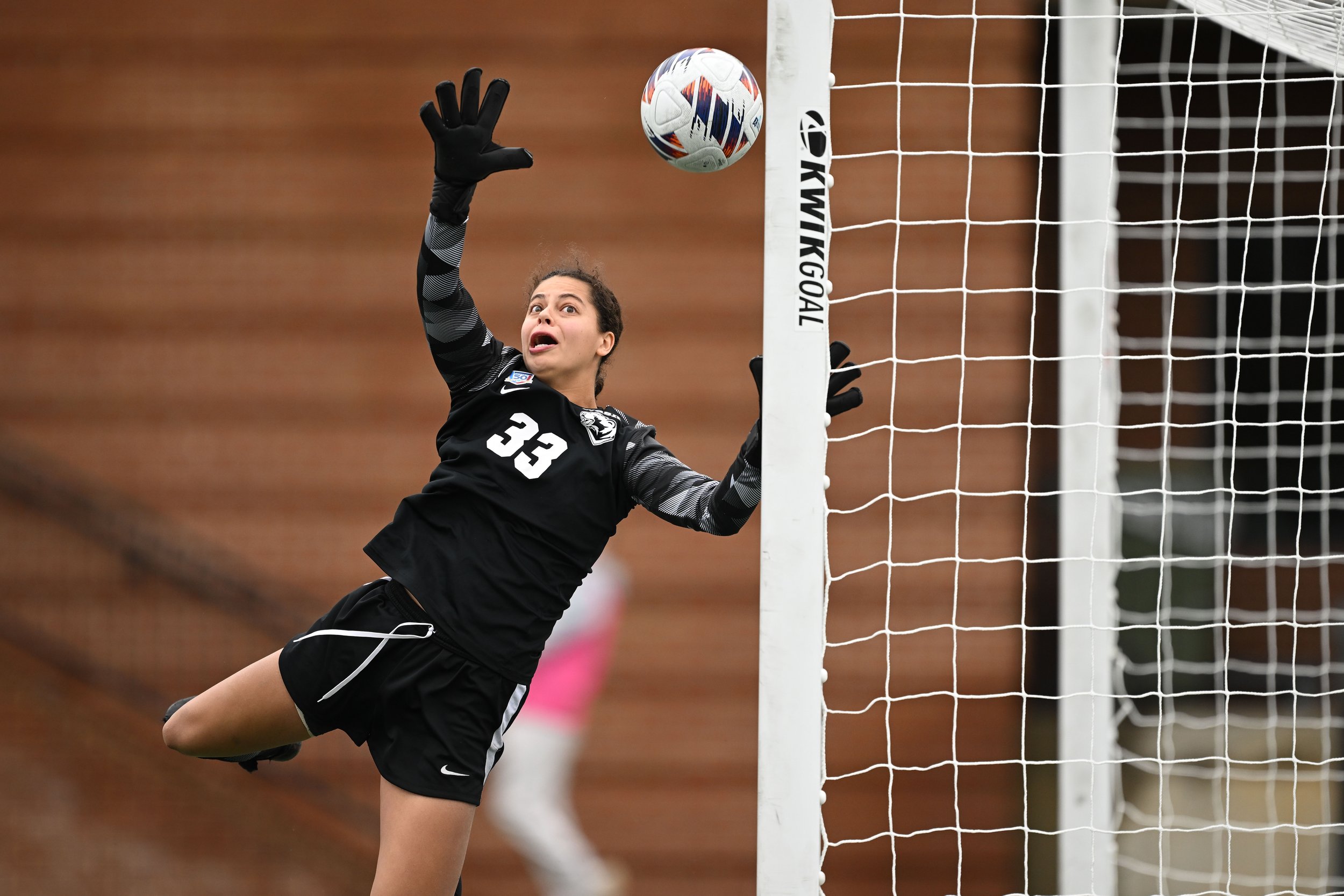  SALEM, VIRGINIA - DECEMBER 02: Sidney Conner #33 of Washington Bears attempts a save against the Cal Lutheran Regals during the 2023 Division III Women's Soccer Championship at Donald J. Kerr Stadium on December 02, 2023 in Salem, Virginia. Cal Luth