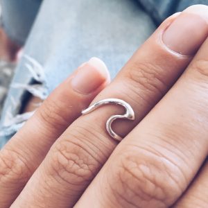 Mini Wave Ring – Made for the ocean lovers, the mini wave ring is lightly hammered, making it catch the light and glisten, like waves in the sun. Order a couple sizes smaller to wear it as a midi ring.