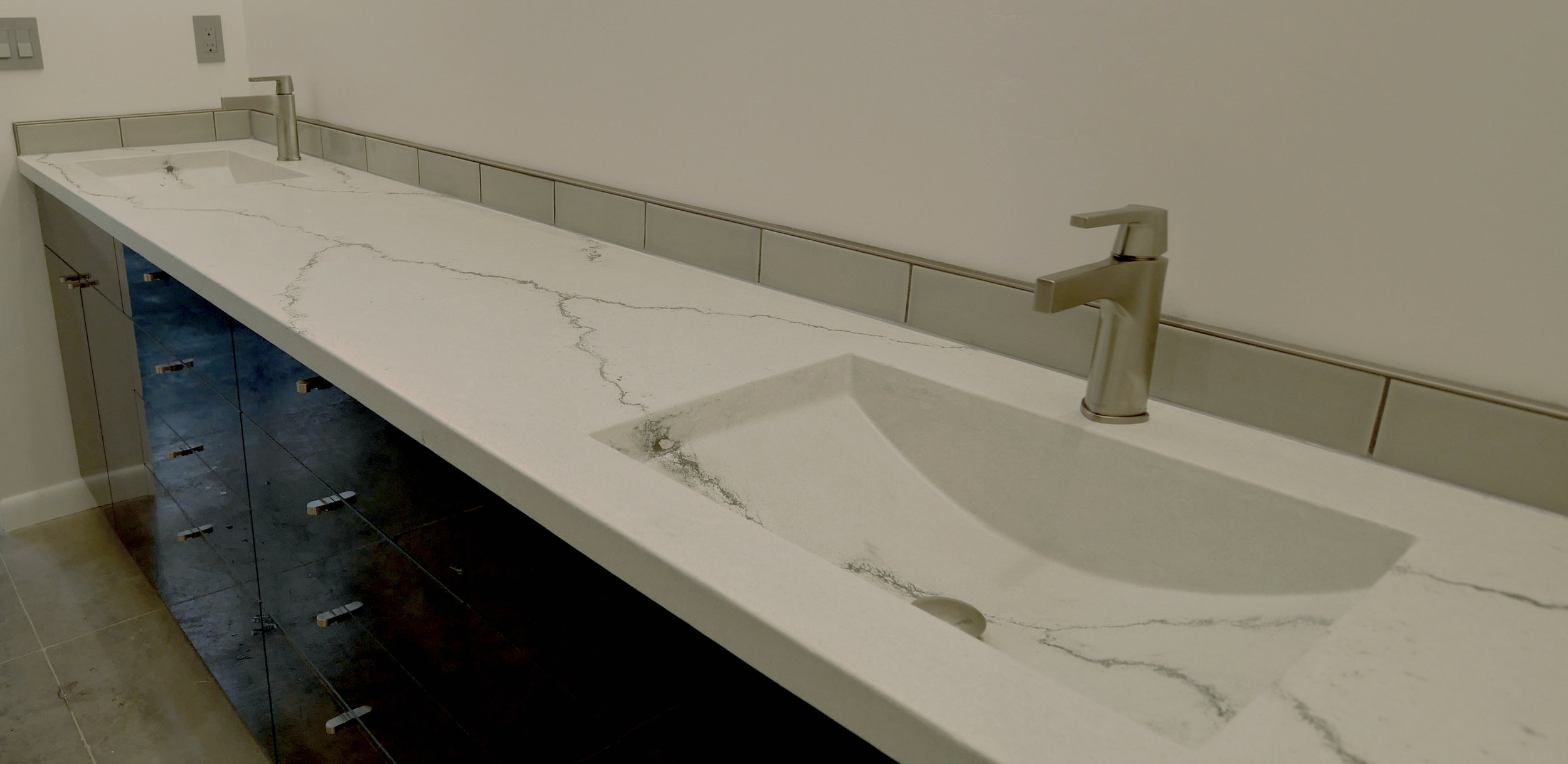 Veined Concrete Vanity with Integrated Sinks.jpg