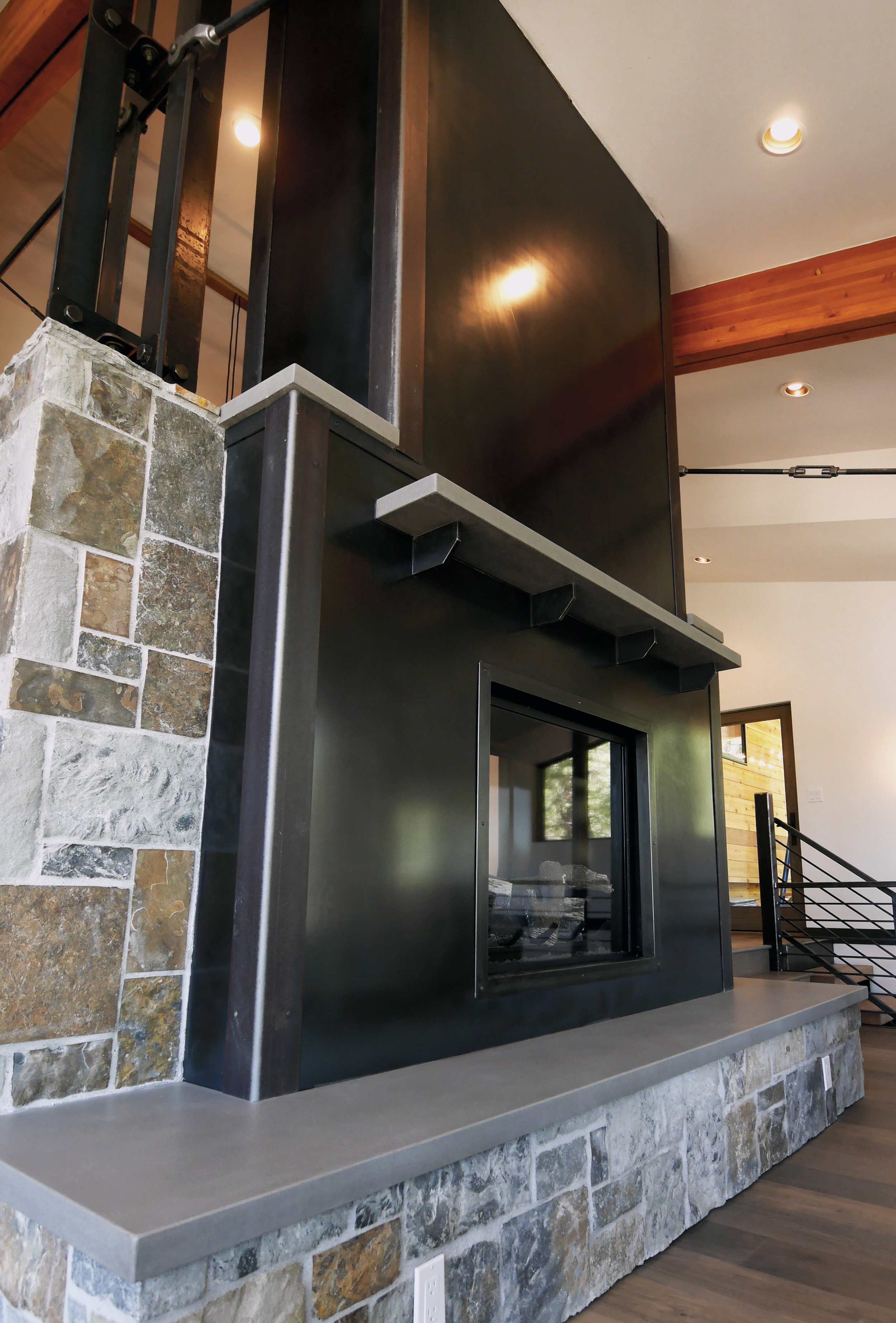Steel Panel Fireplace with Floating Concrete Mantle and Hearth.jpg