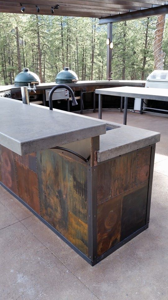 ECC Handpressed Concrete Outdoor Kitchen Countertop with custom Patinaed Steel.jpg