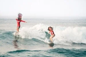 FRIENDS FROLICKING AT FUNSET