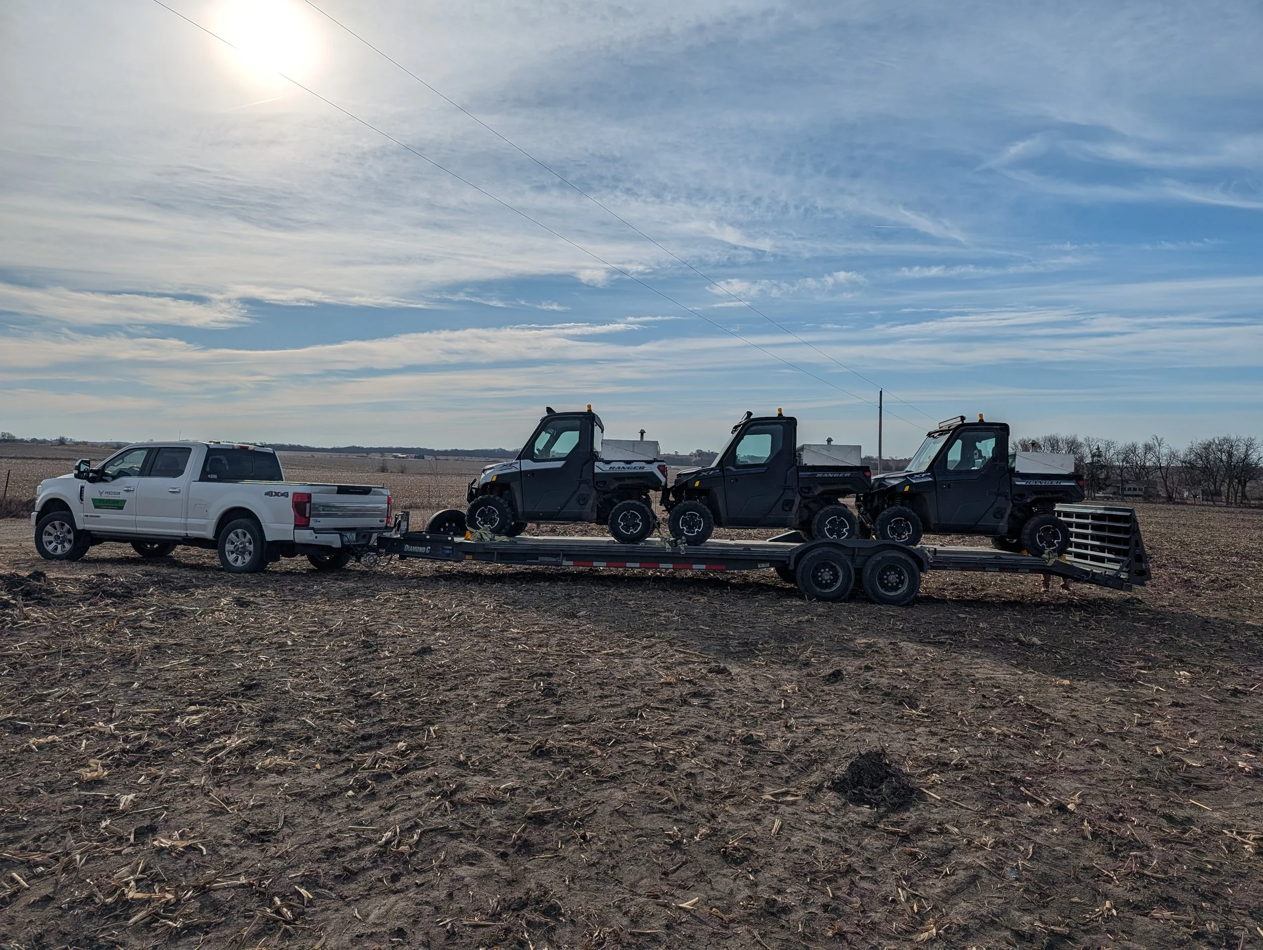 3 Polaris Ranger 1000's on 30' trailer