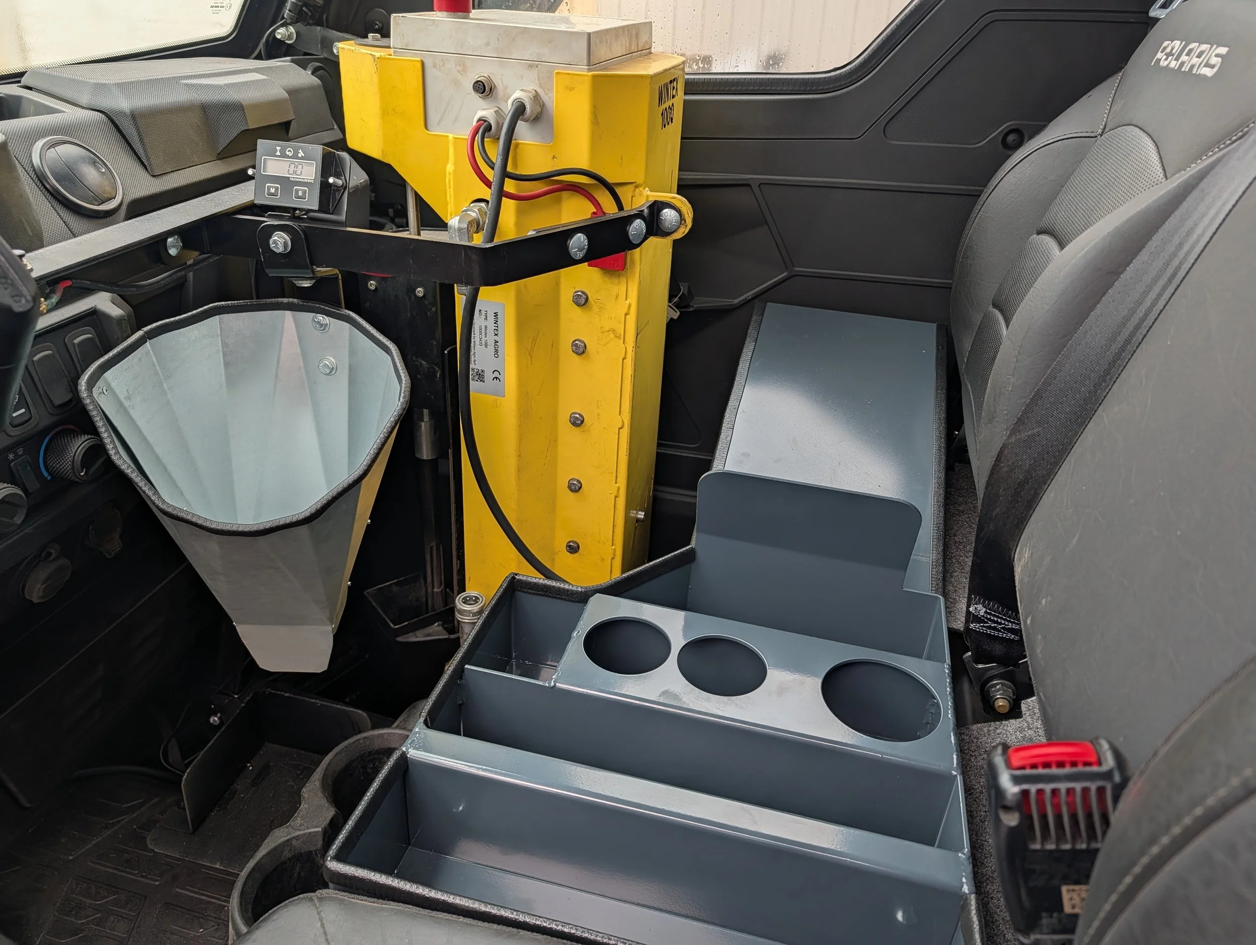 Cab organizer and soil funnel inside Polaris Ranger 1000