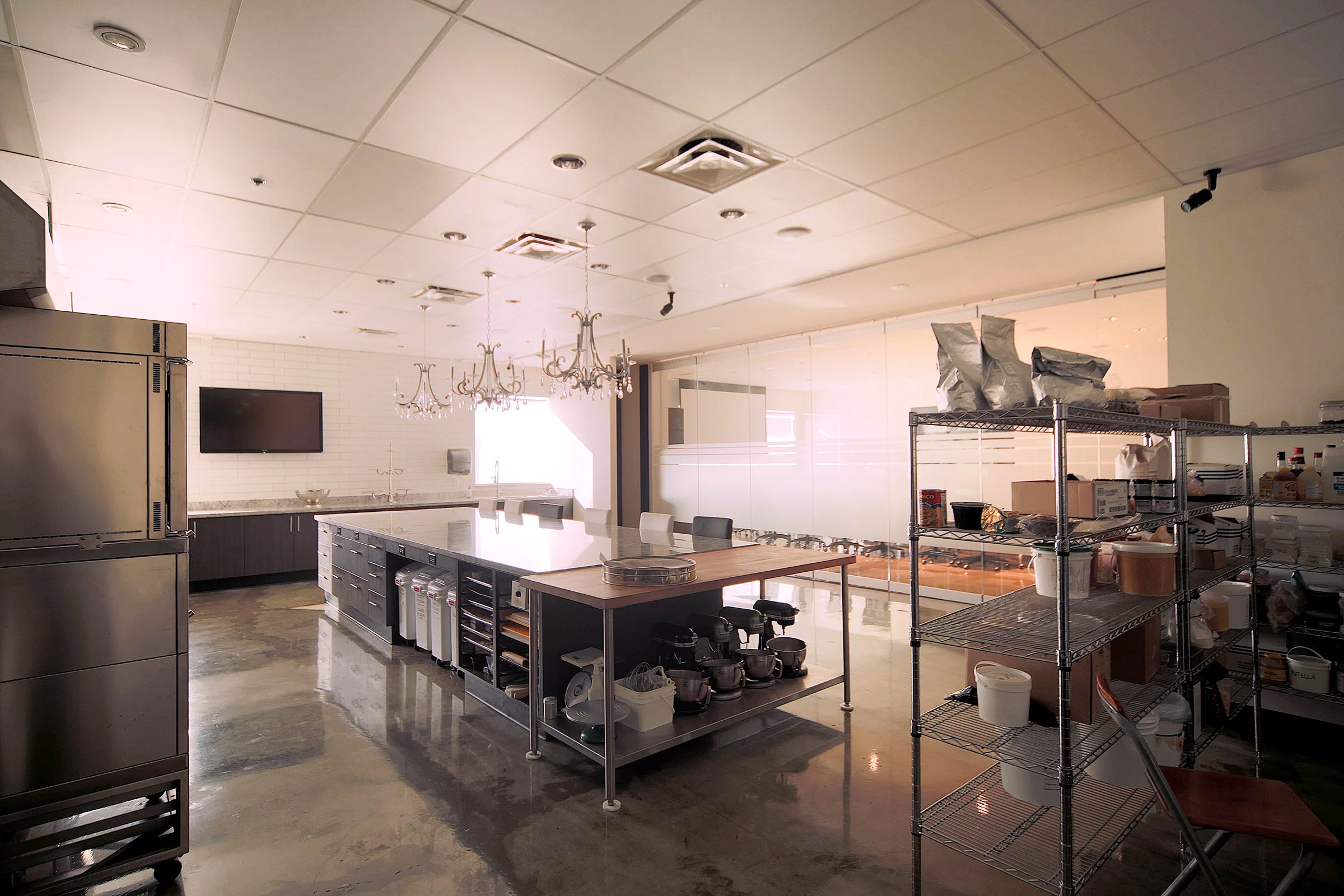 In a space as versatile and intriguing as a demonstration kitchen, the last thing this client wanted was AV systems that added cutter. Screens, cameras and controls were installed discretely.