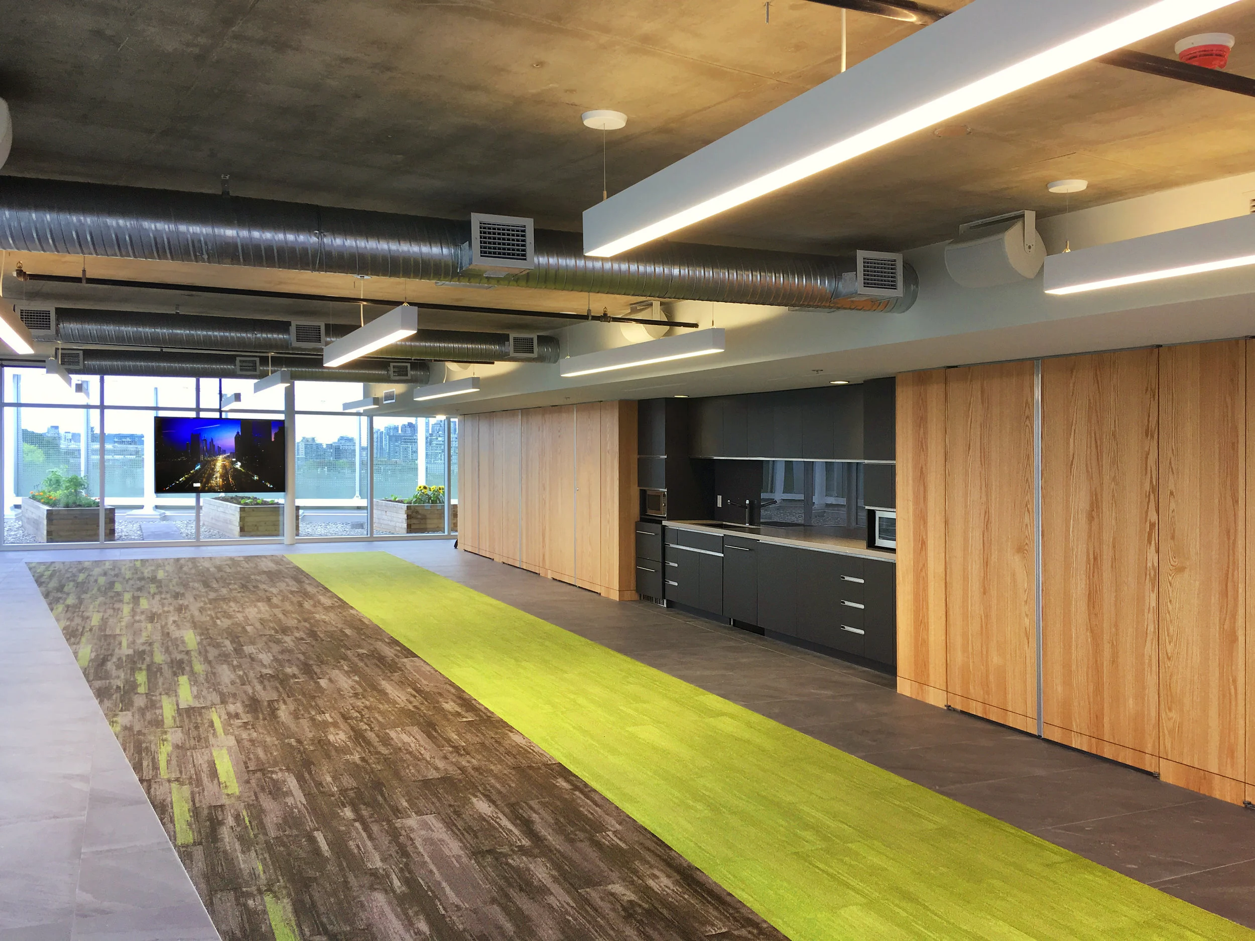 A beautiful jewel on the crown of a prominent commercial development in the heart of Vancouver, this rooftop assembly space has a self-serve, indoor/outdoor AV package.