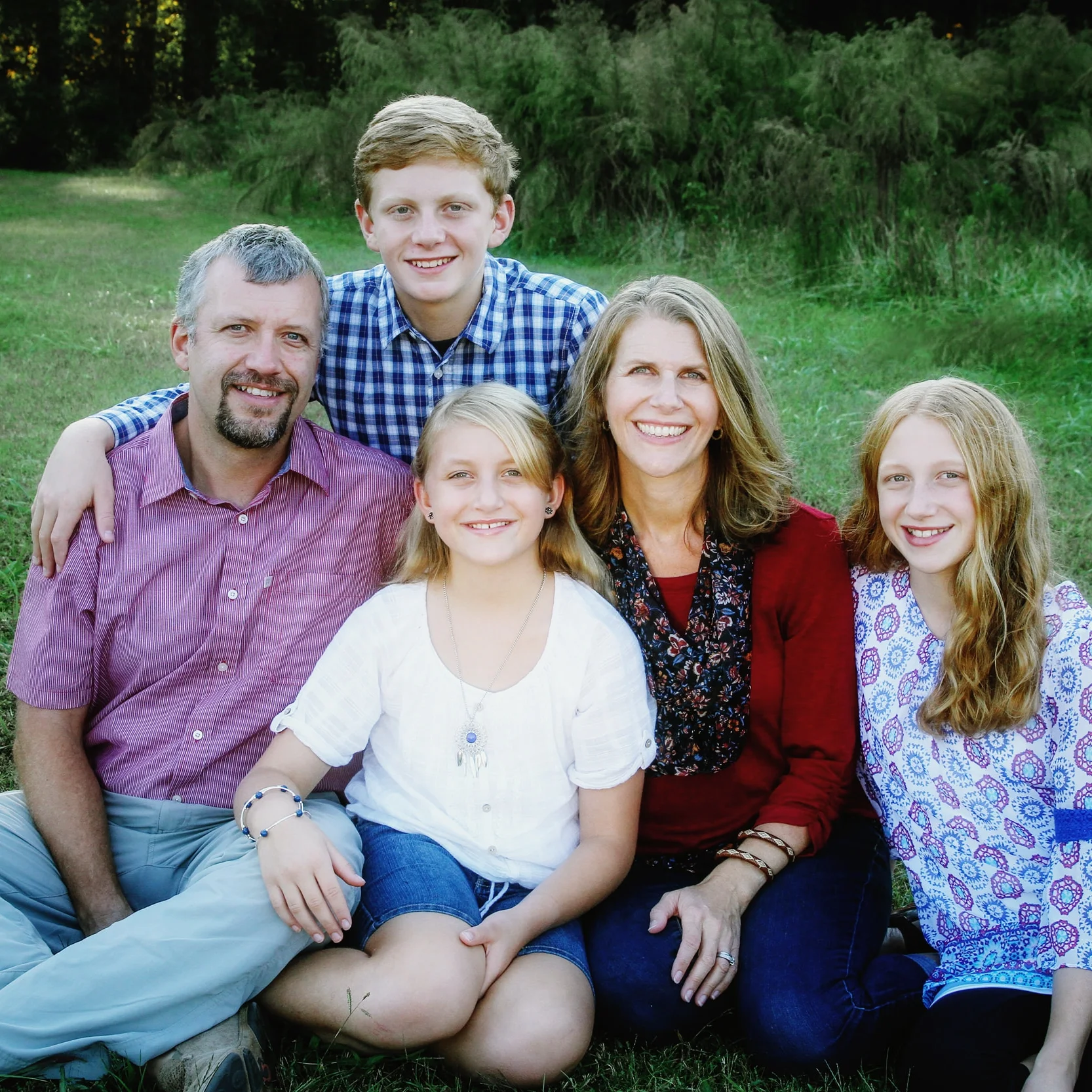 We love our portraits, and our family photo album! Thanks so much for the entire process - from coordinating our outfits to hanging the prints in our home.