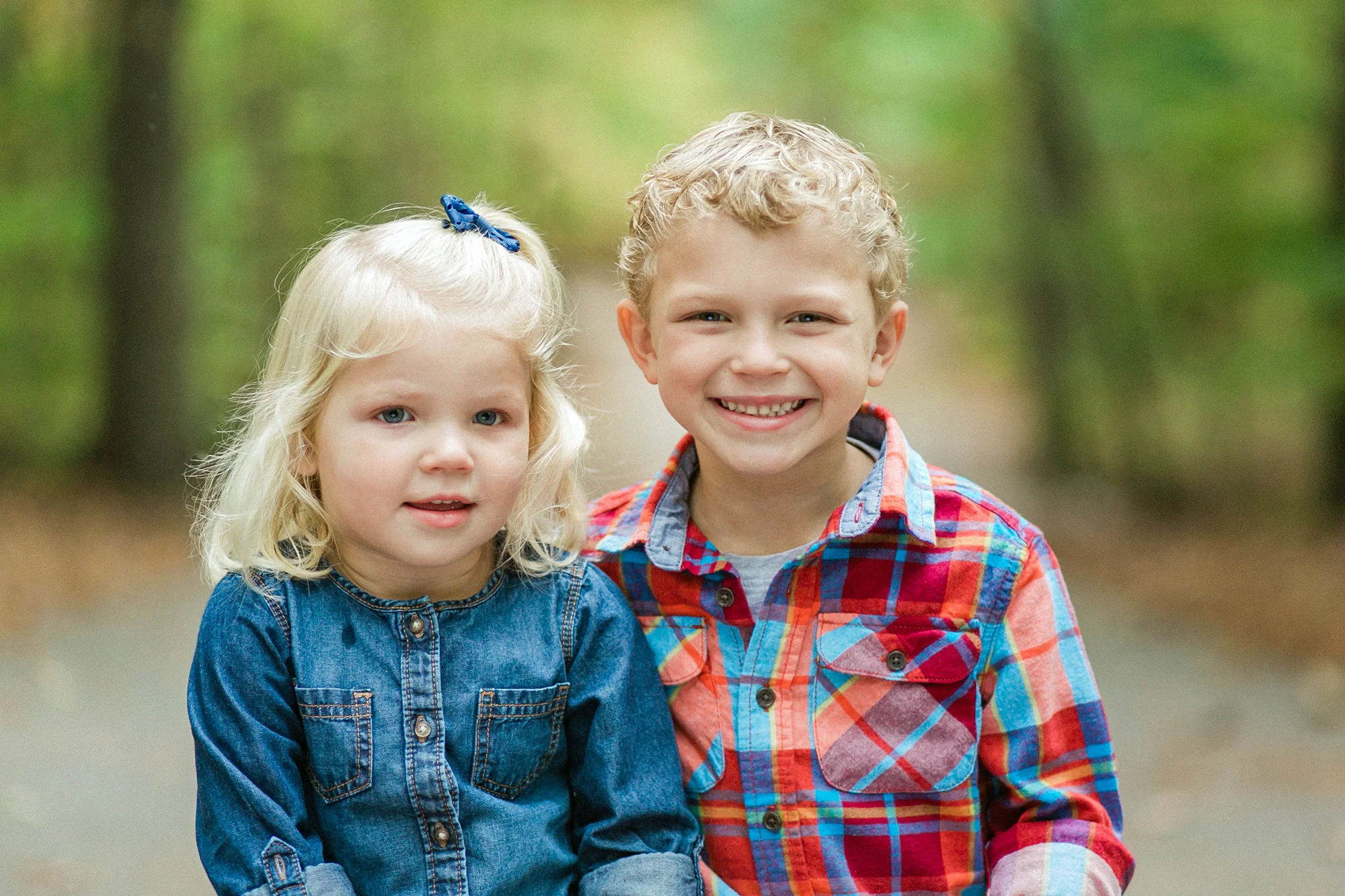 Two adorable children smiling at the camera