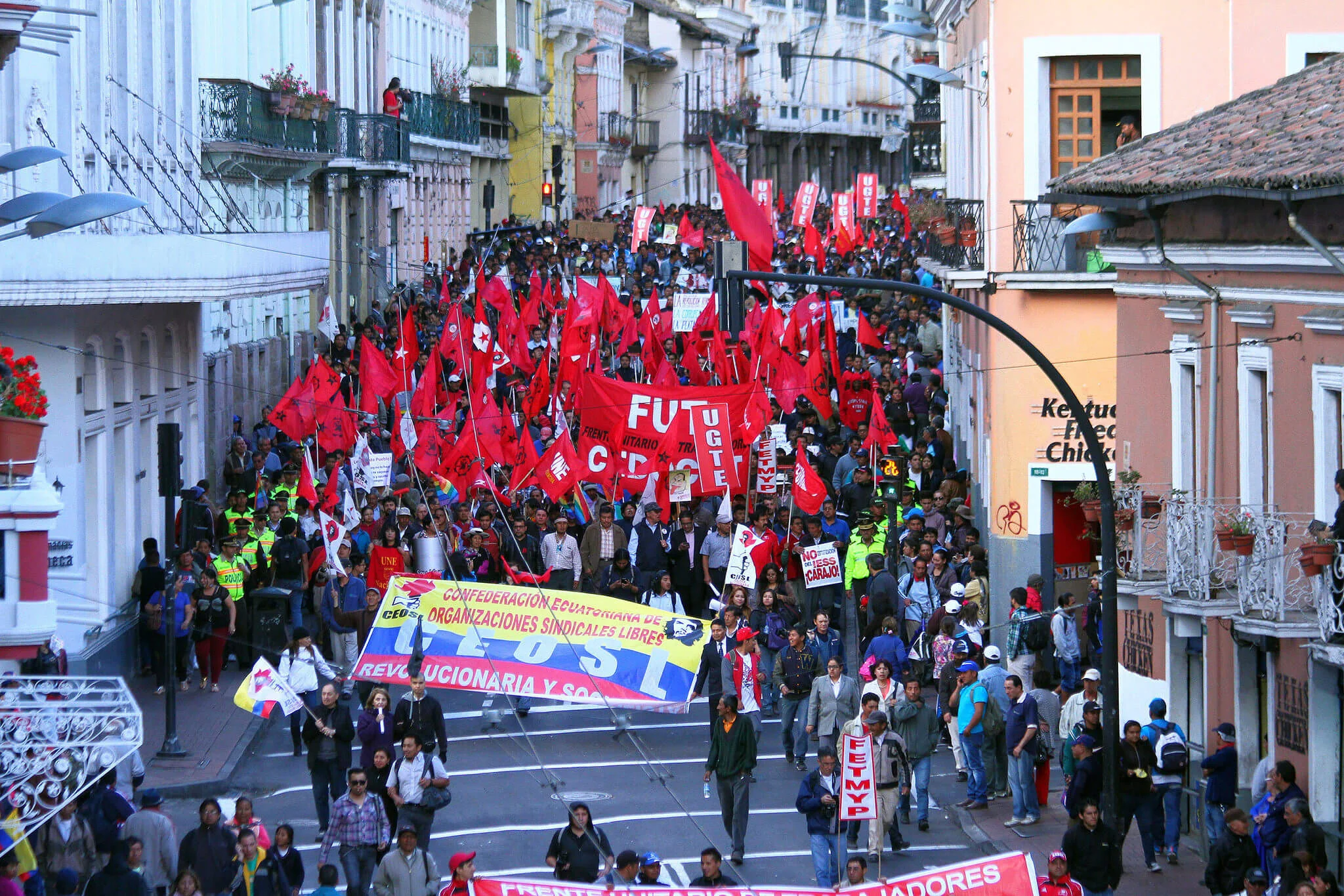 “Marcha 24 Jun” by Carlos Rodriguez/Andes is licensed under CC By 4.0