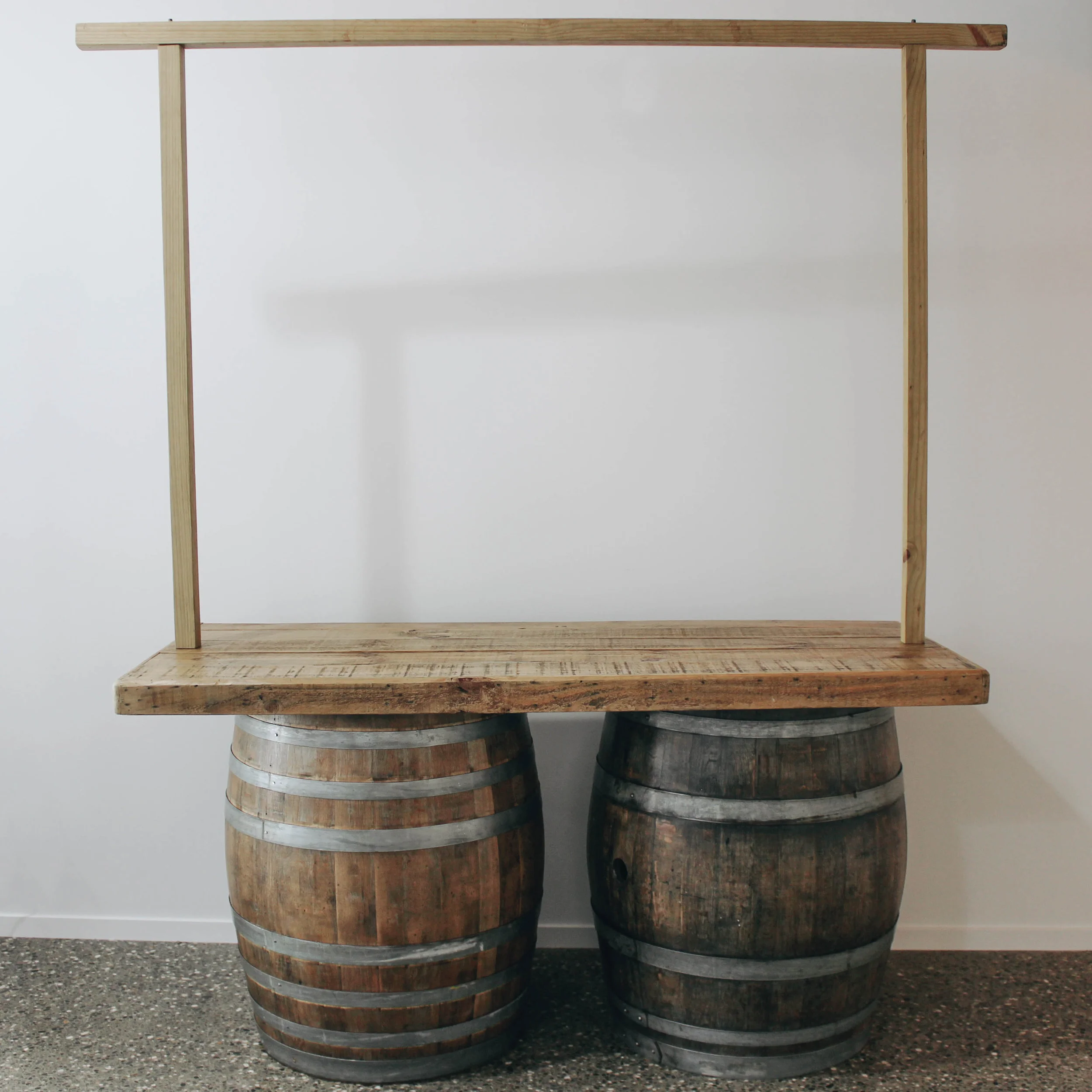 Timber top wine barrel bar with frame.jpg