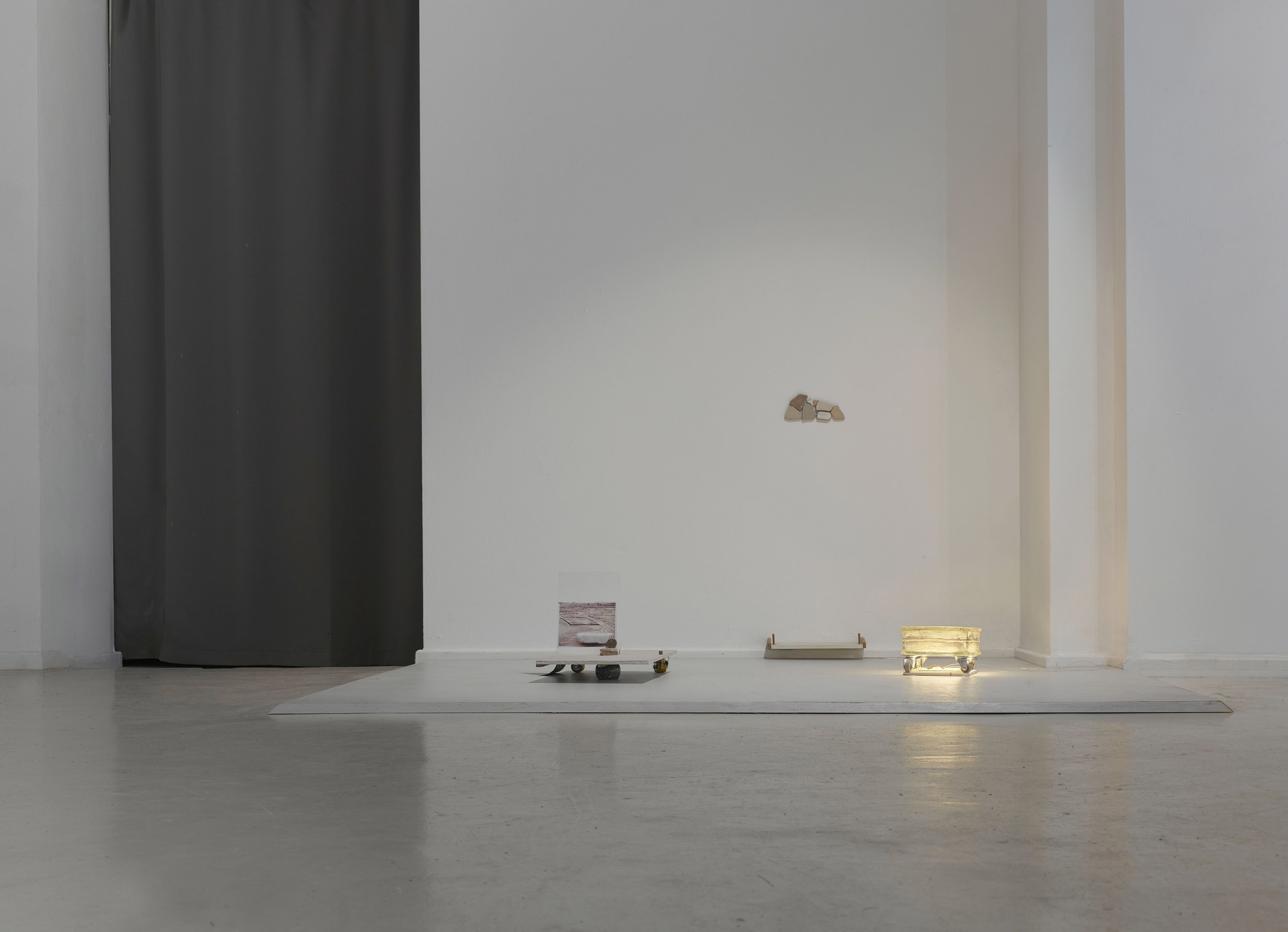    Time in stone (ORIENT)  , 2018  sea tiles, granite, brass, glass, LED, plaster, marble leaf and door knob, rubber casters, abacus, plaster board, velvet, steel joints, beads, inkjet print on paper  Dimensions variable 