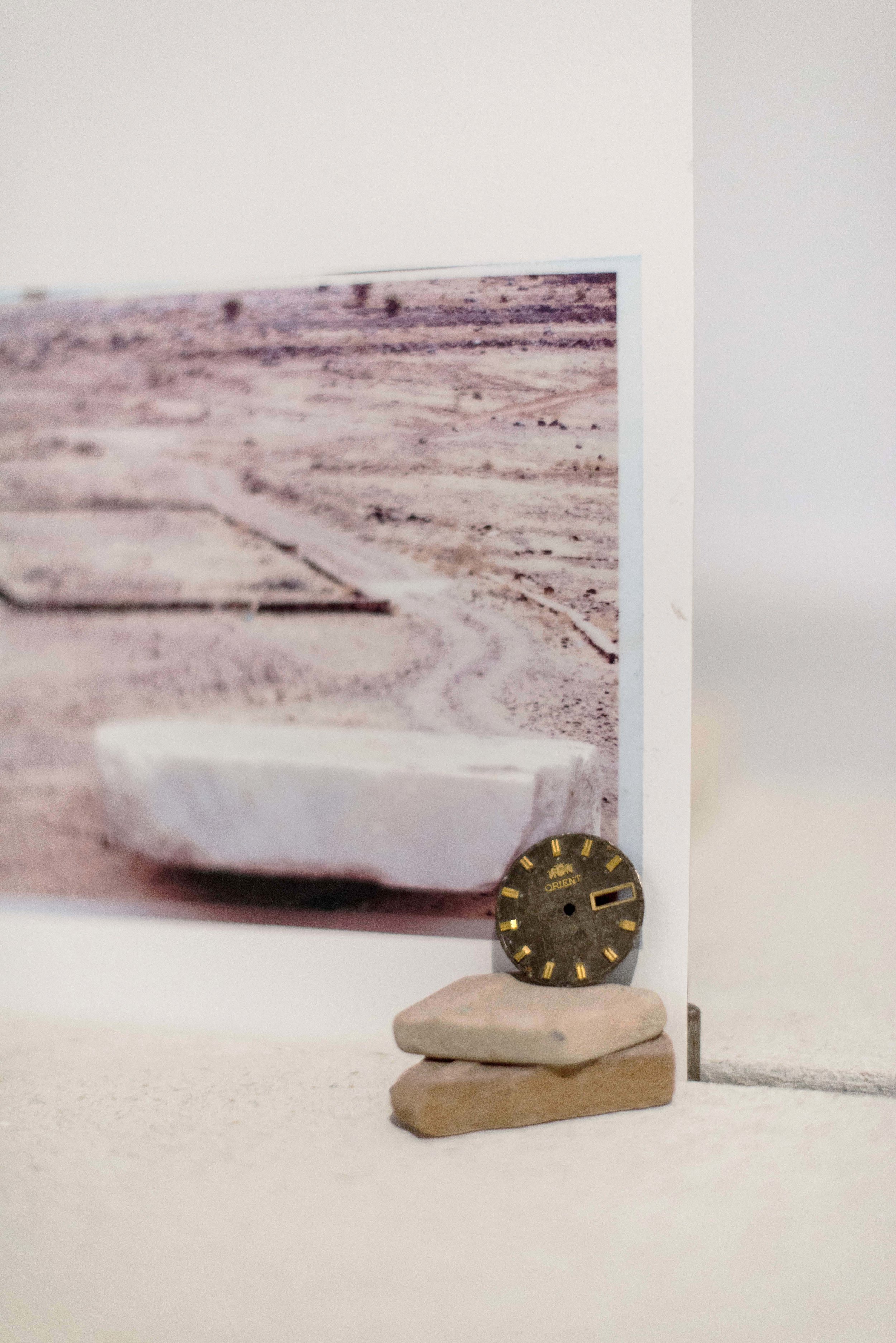 Time in stone (ORIENT) , 2018 Detail: watch dial, sea tiles, plaster board and inkjet print on paper