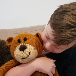Cuddles with Ted.png