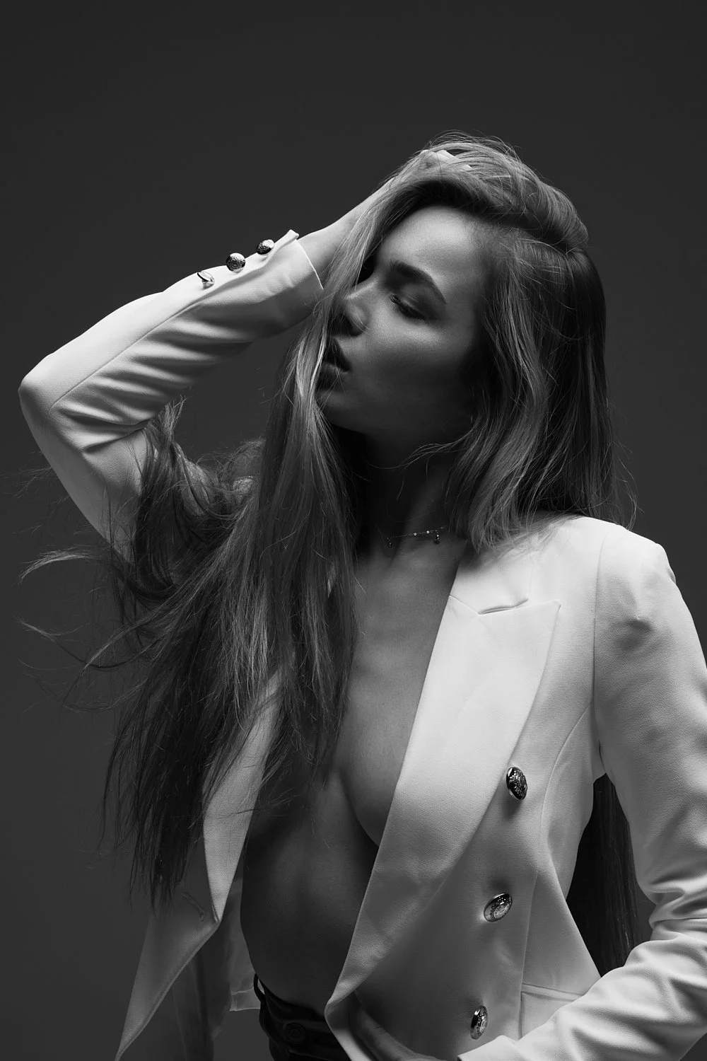 Young Blonde Model With Long Hair Posing