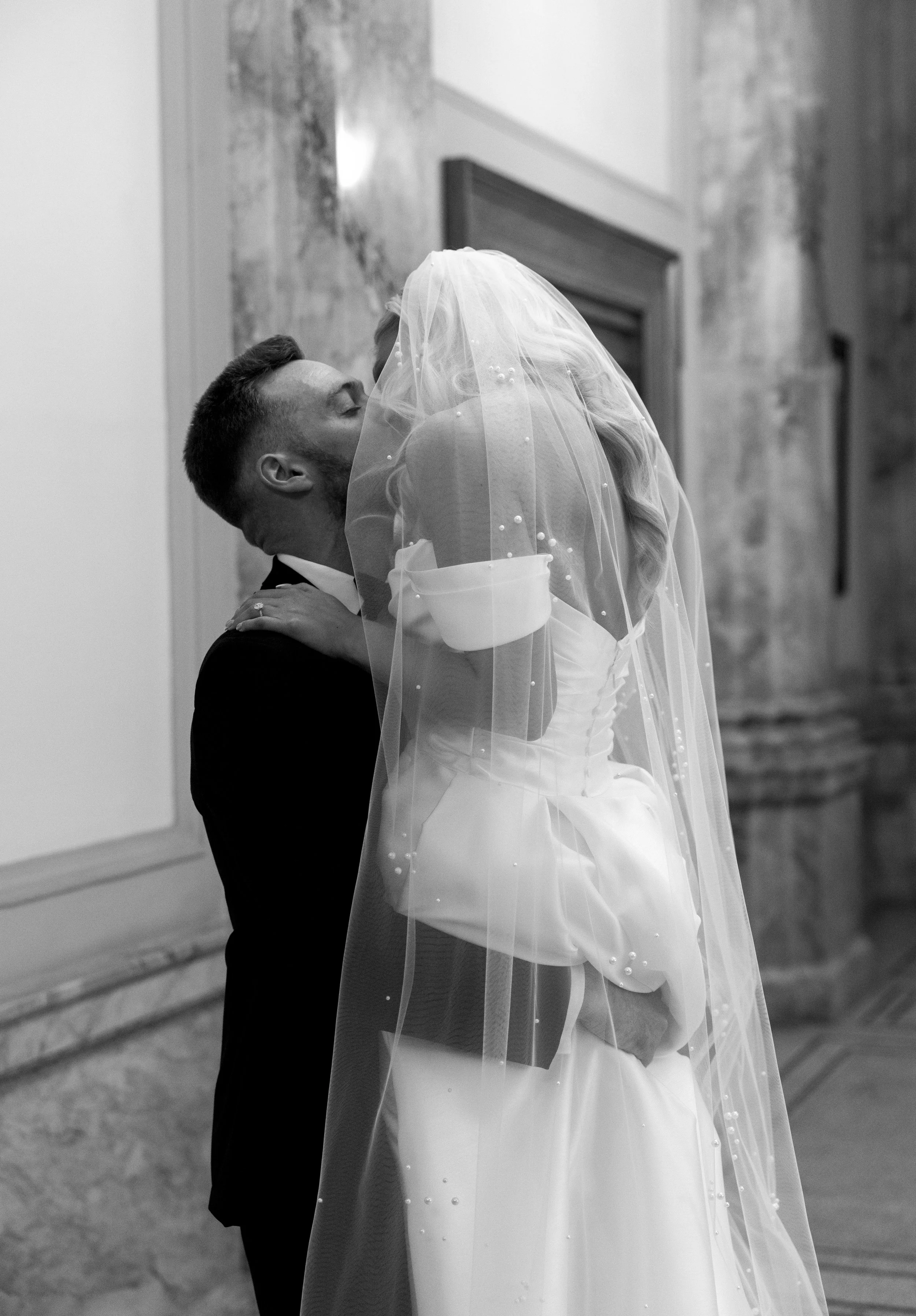 Milwaukee wedding couple sharing a romantic kiss
