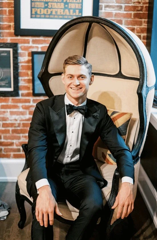 Groom relaxing in the Duke Suite before his wedding ceremony at St. James 1868.