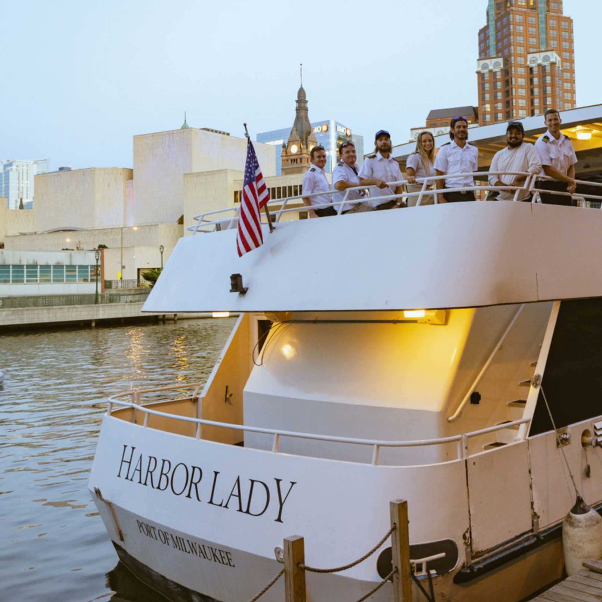 Edelweiss Cruise sailing along Milwaukee River with downtown skyline views during wedding rehearsal dinner