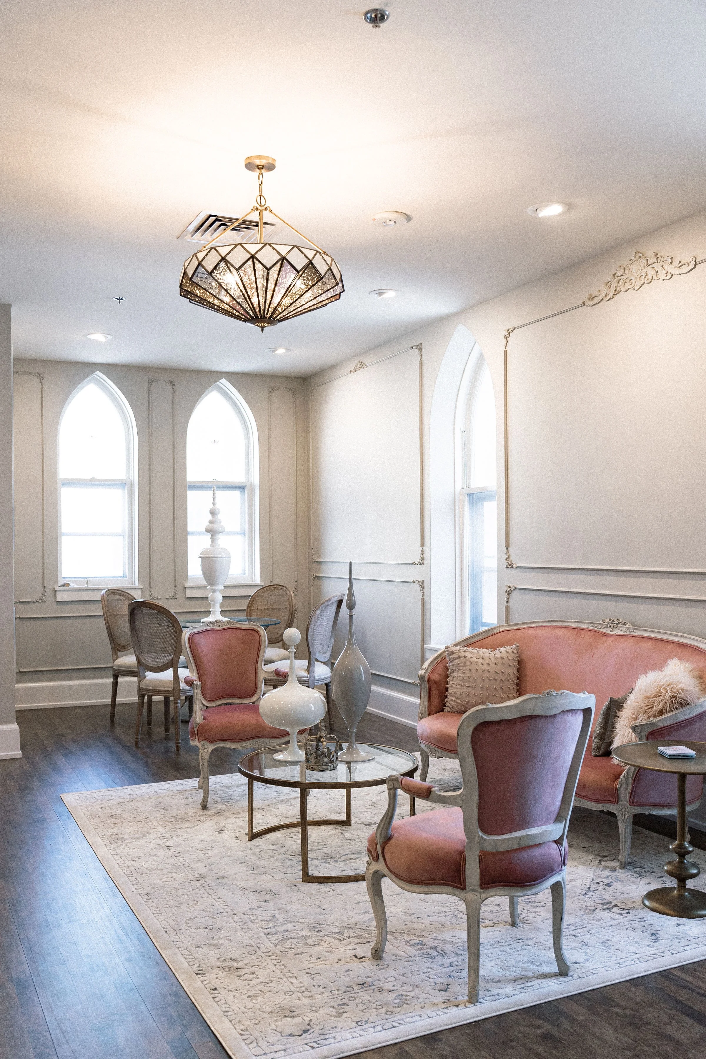 Hathaway Suite bridal suite at The Hyde featuring elegant seating areas, large windows, and a bright getting ready space for Milwaukee weddings
