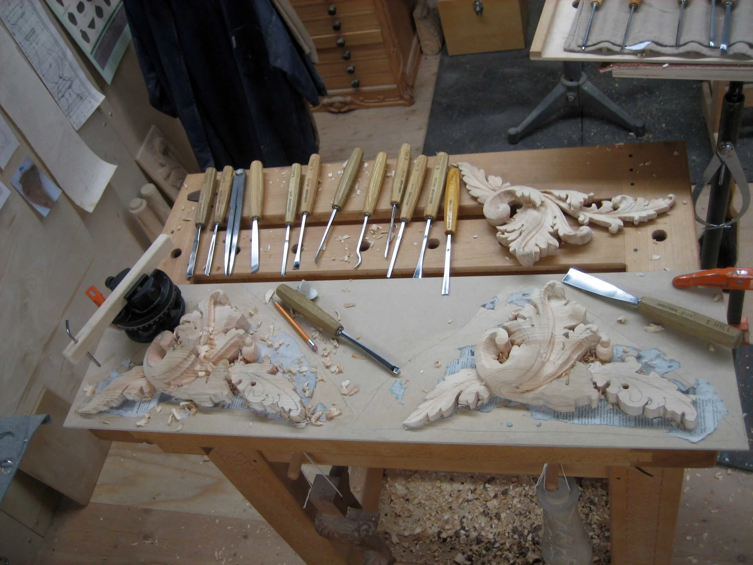 06 – Next I started on the carvings on either side of the door. They were in mirror images. I tried carving two at a time to speed things up.