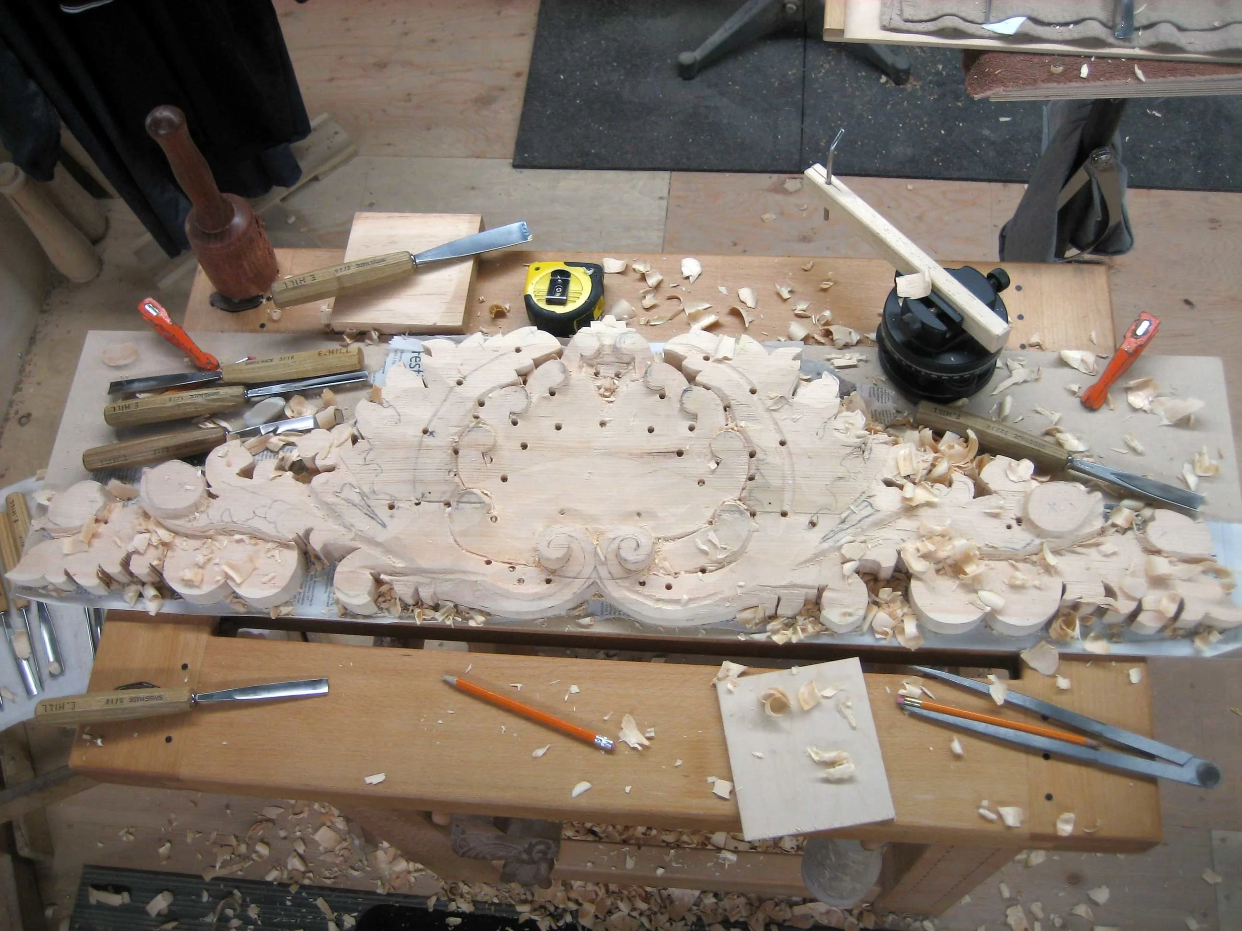 07 – Starting on the large top carving. I drilled depth holes to keep from carving to deep or too shallow.