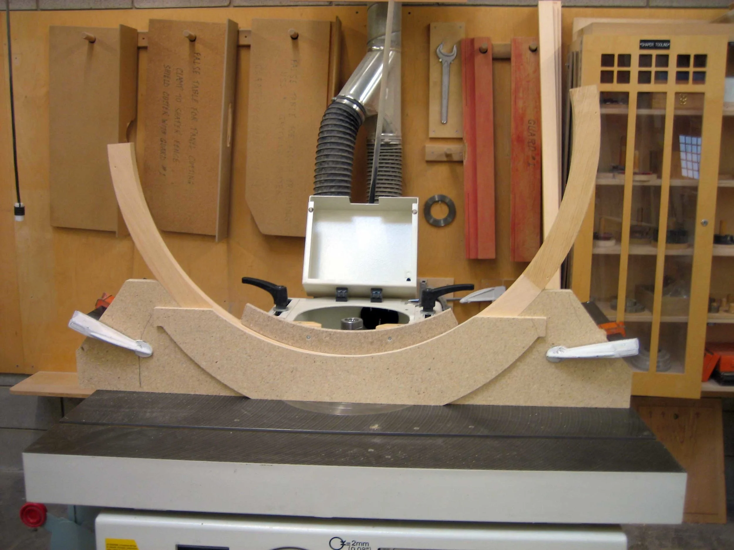 34 – I had to build a jig in order to run the cutter against the face of the piece.